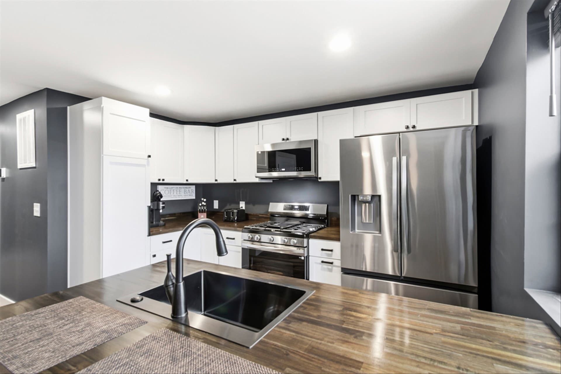 The Loft on Waterbury - Kitchen Space with cabinet storage