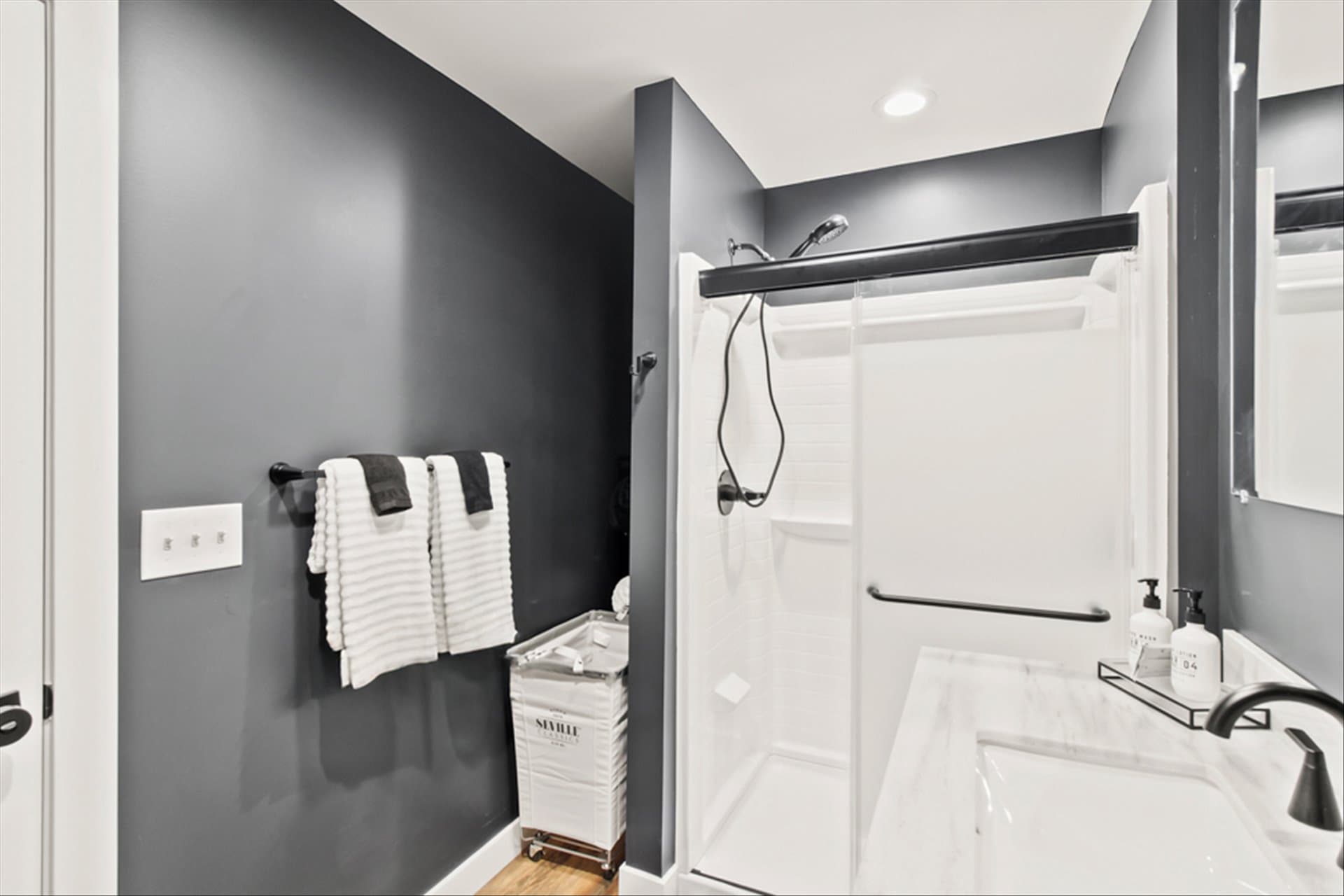 The Loft on Waterbury - Shower with privacy glass shower door
