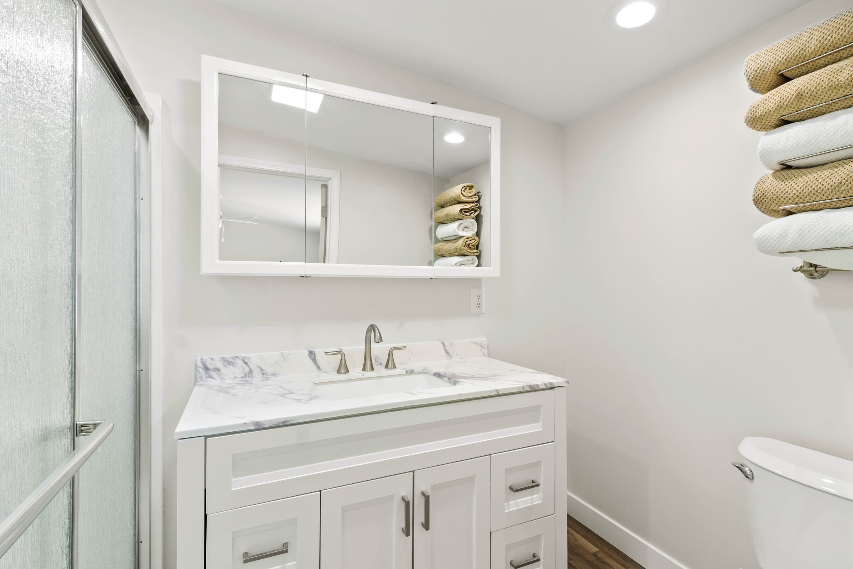 The Waterbury Way - Primary Bath Sink with plenty of Vanity Cabinet