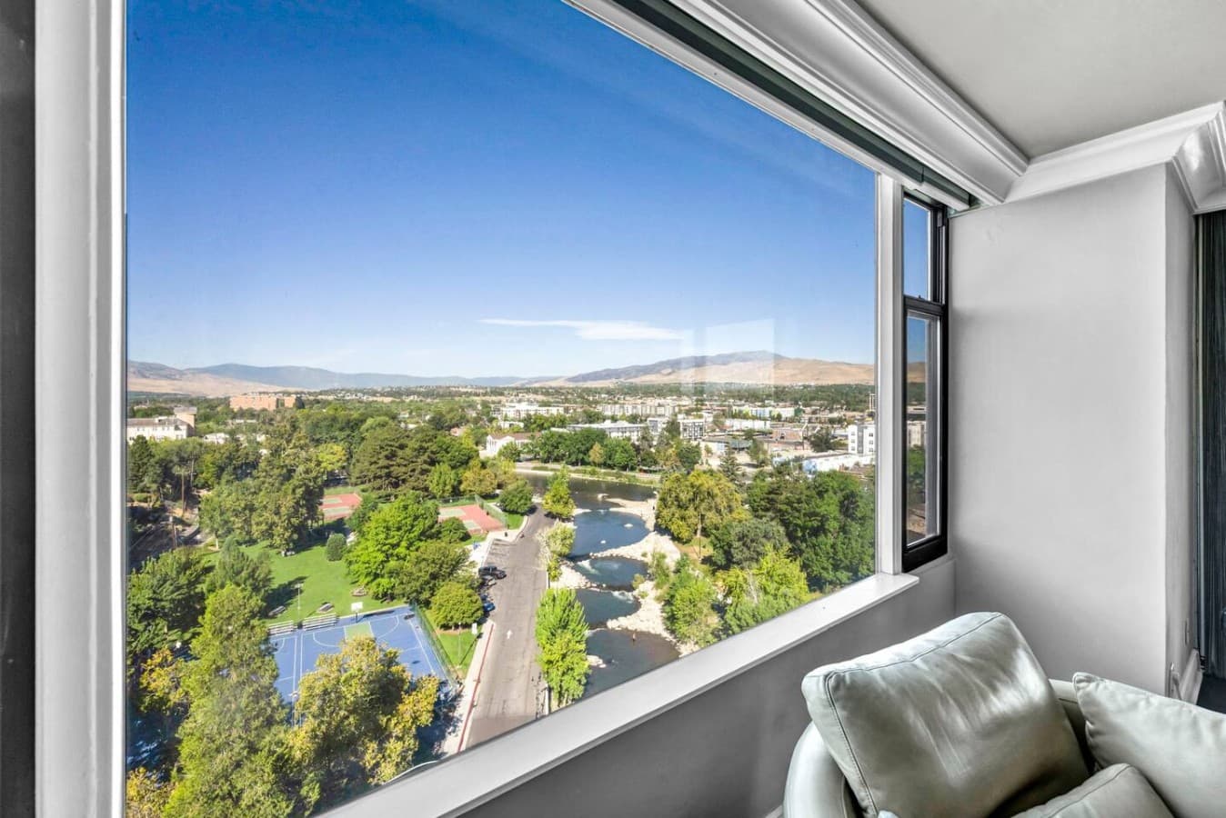 Relax above the city with the mountains in sight.