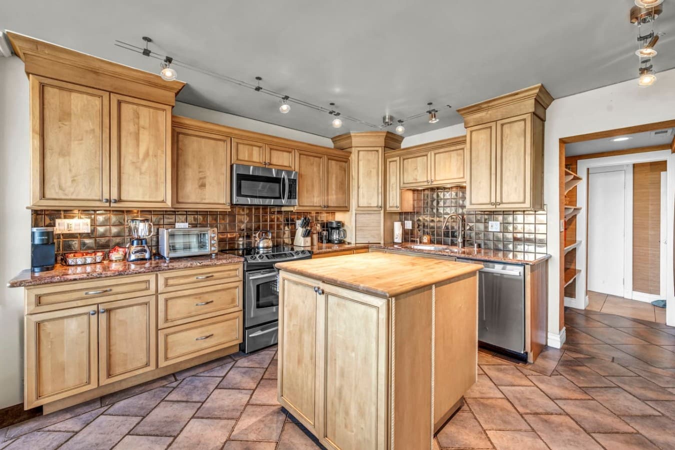 An open kitchen and dining space designed for easy gathering.