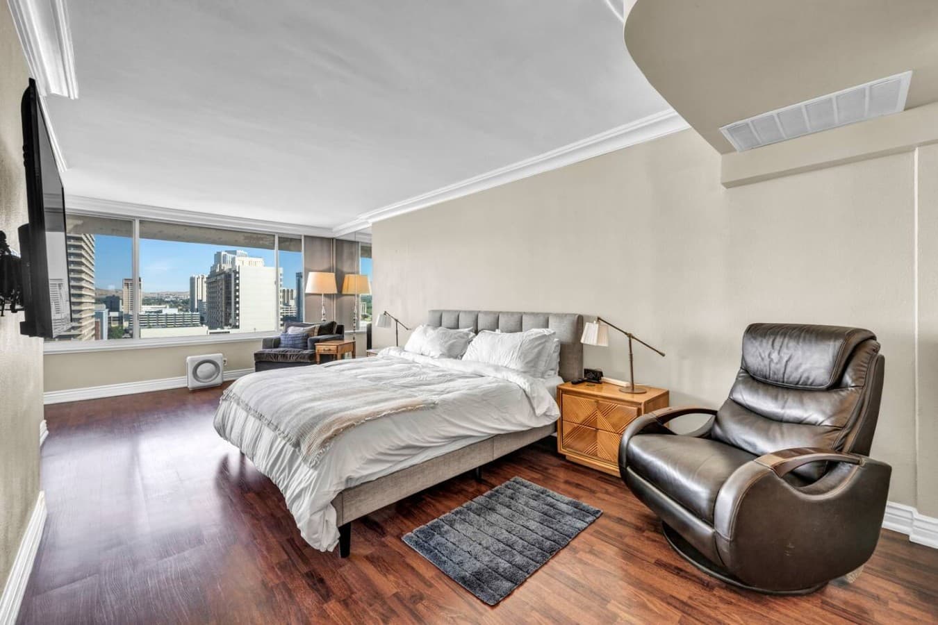 Wake up to downtown views from a spacious king bedroom.