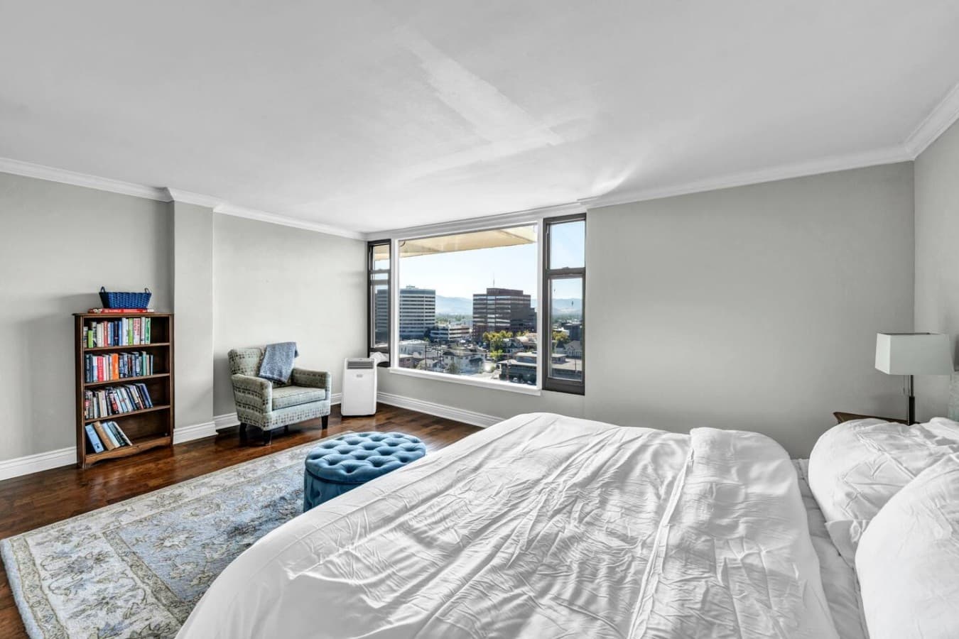 A relaxing king bedroom with an elevated Reno outlook.