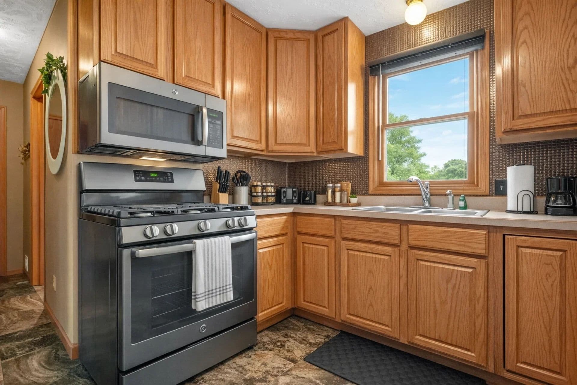 Kitchen Delight: Modern appliances and sunny views make meal prep a pleasure! Perfect for chefs!