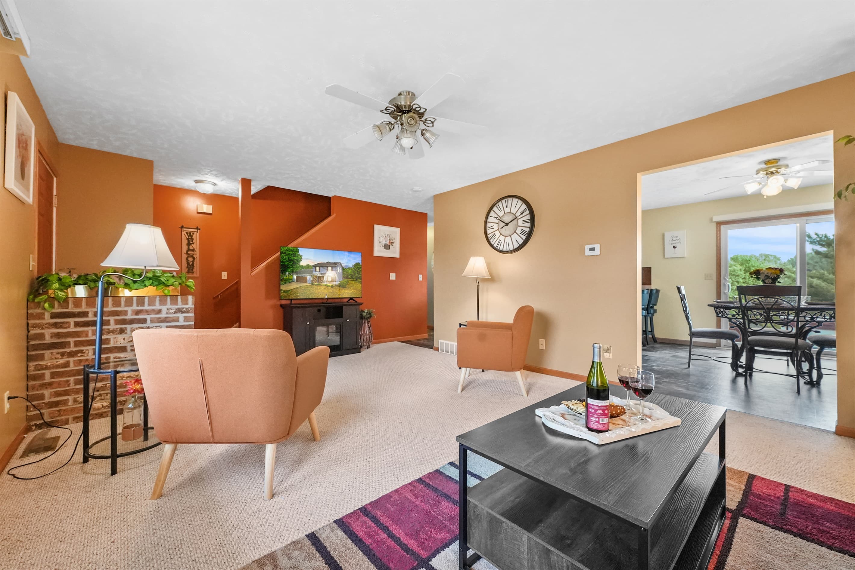Living Room: Relax in style with vibrant decor and inviting views just steps from your favorite activities!