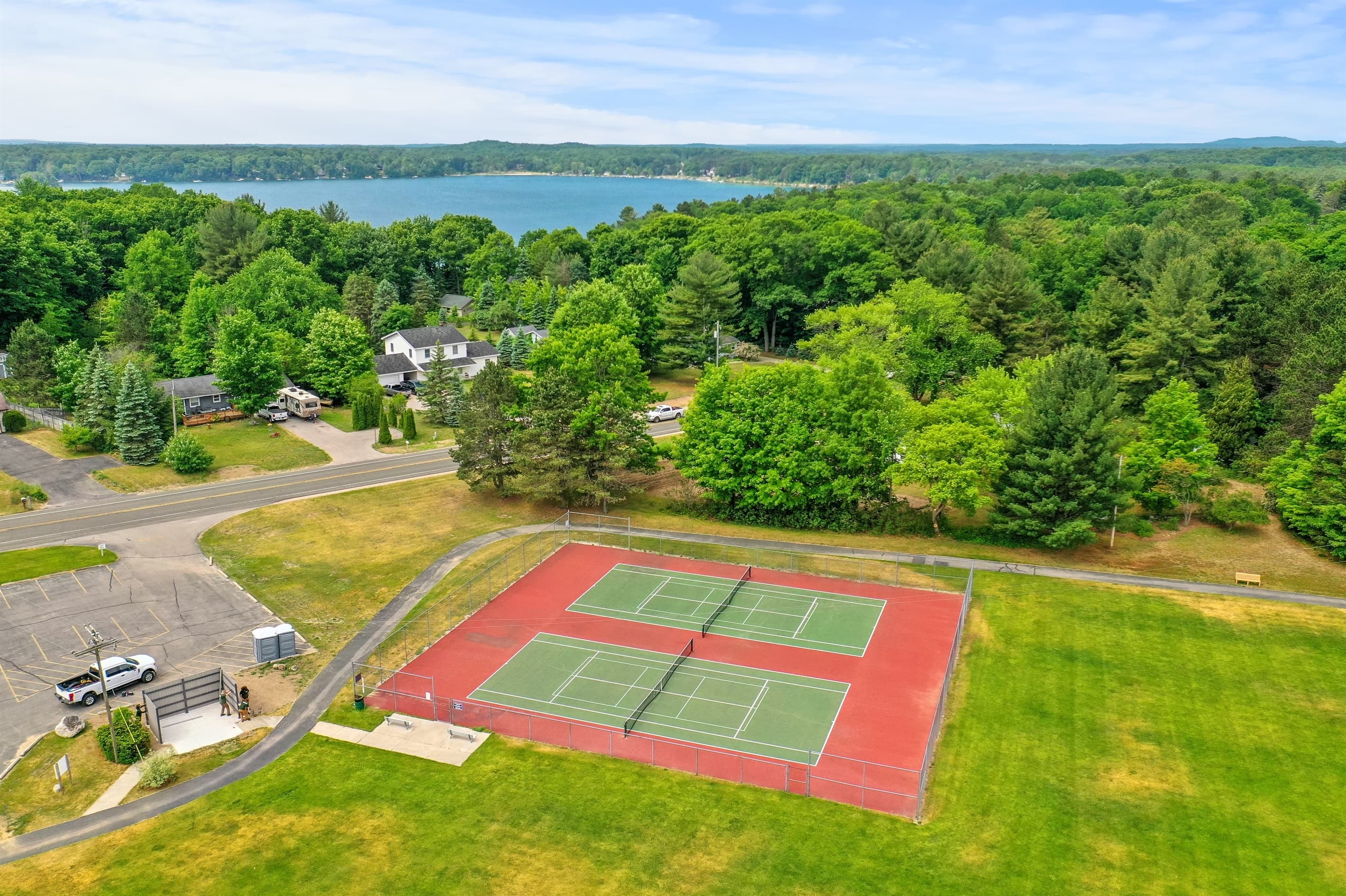 Tennis courts available right across the street from property