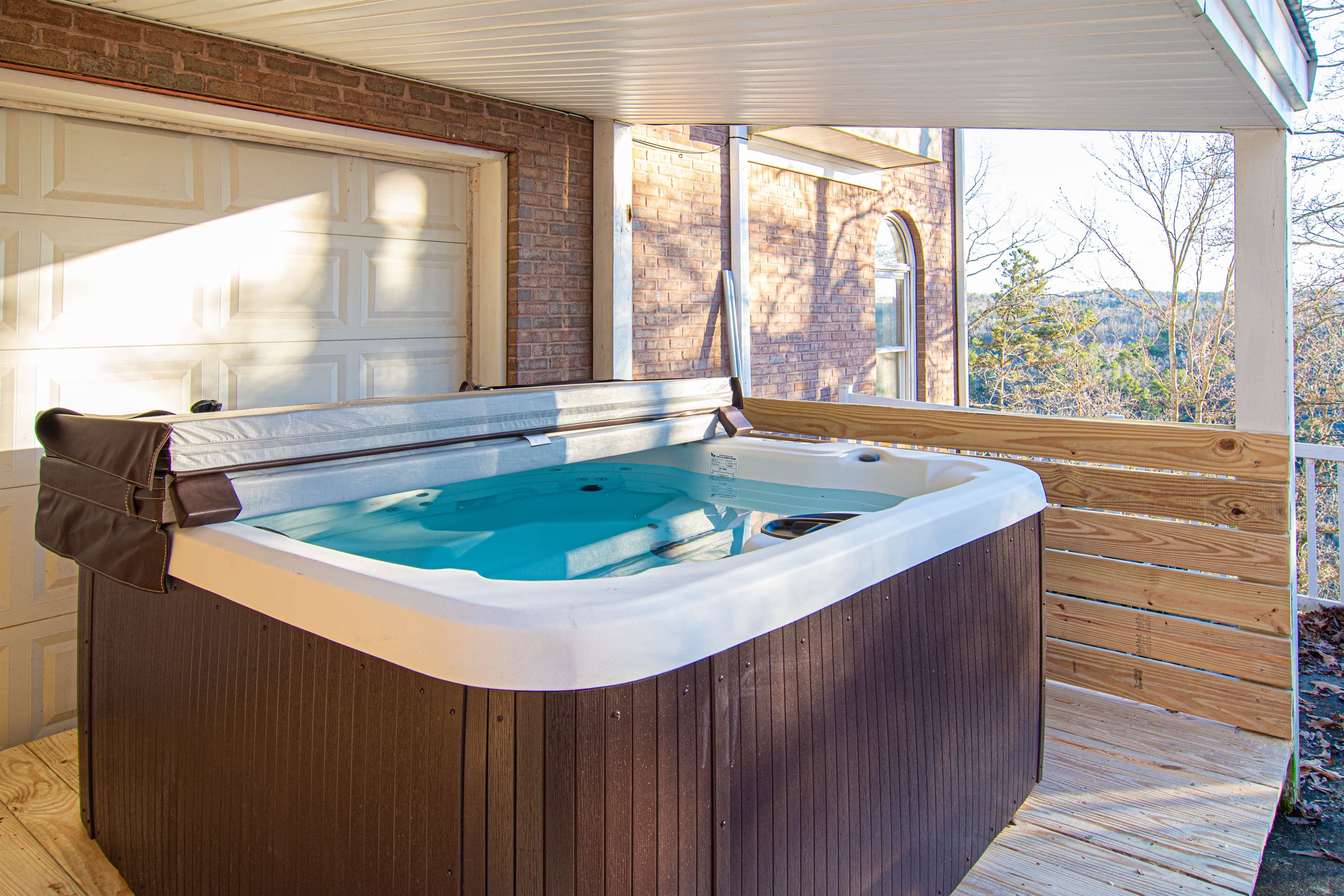 Unwind in our brand new HOT TUB (holds 6 people). Hot Tub Retreat: Soak under the stars in our spacious hot tub with scenic mountain views!
