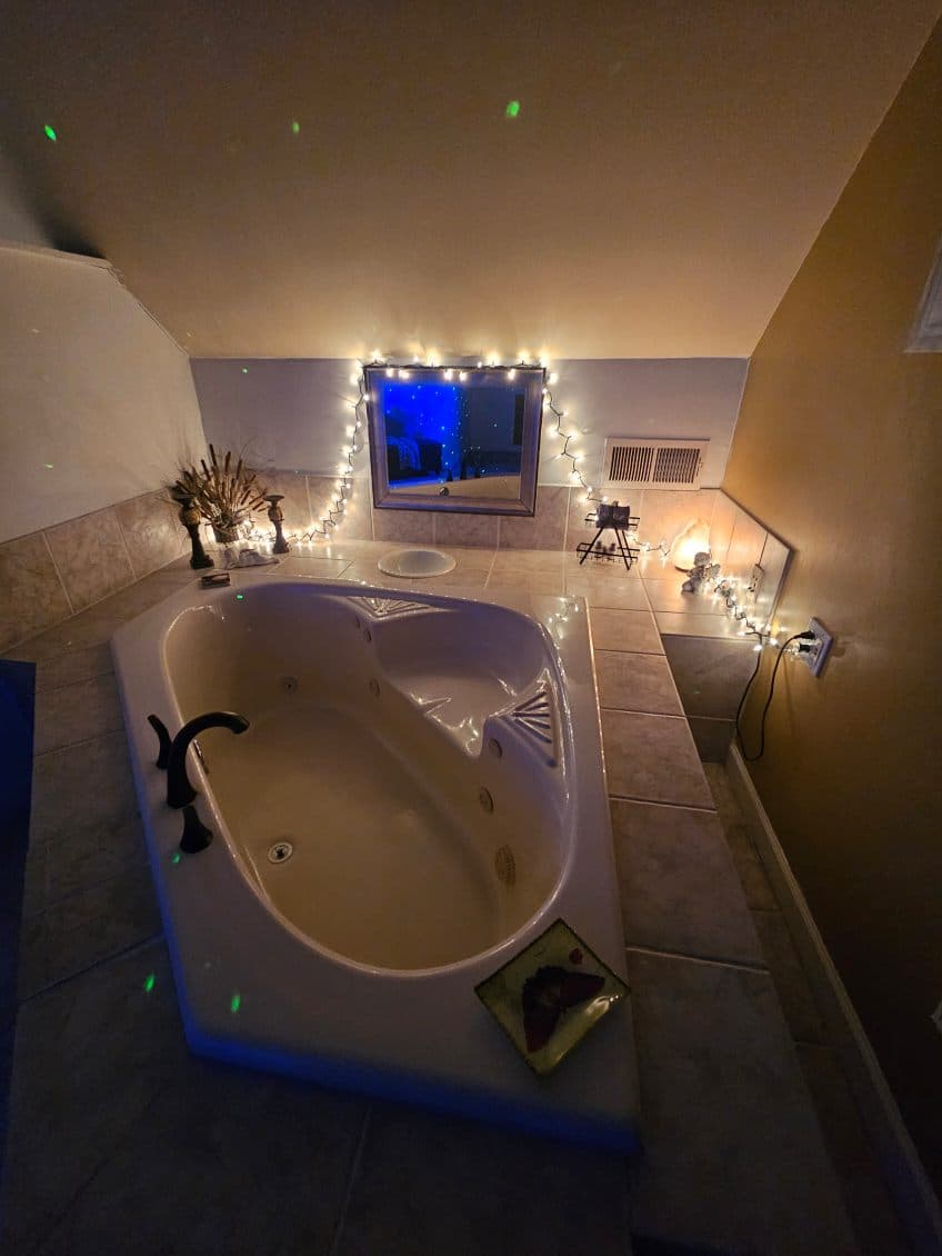 Spa Retreat: Indulge in a luxurious soak with wine and relax in style!
