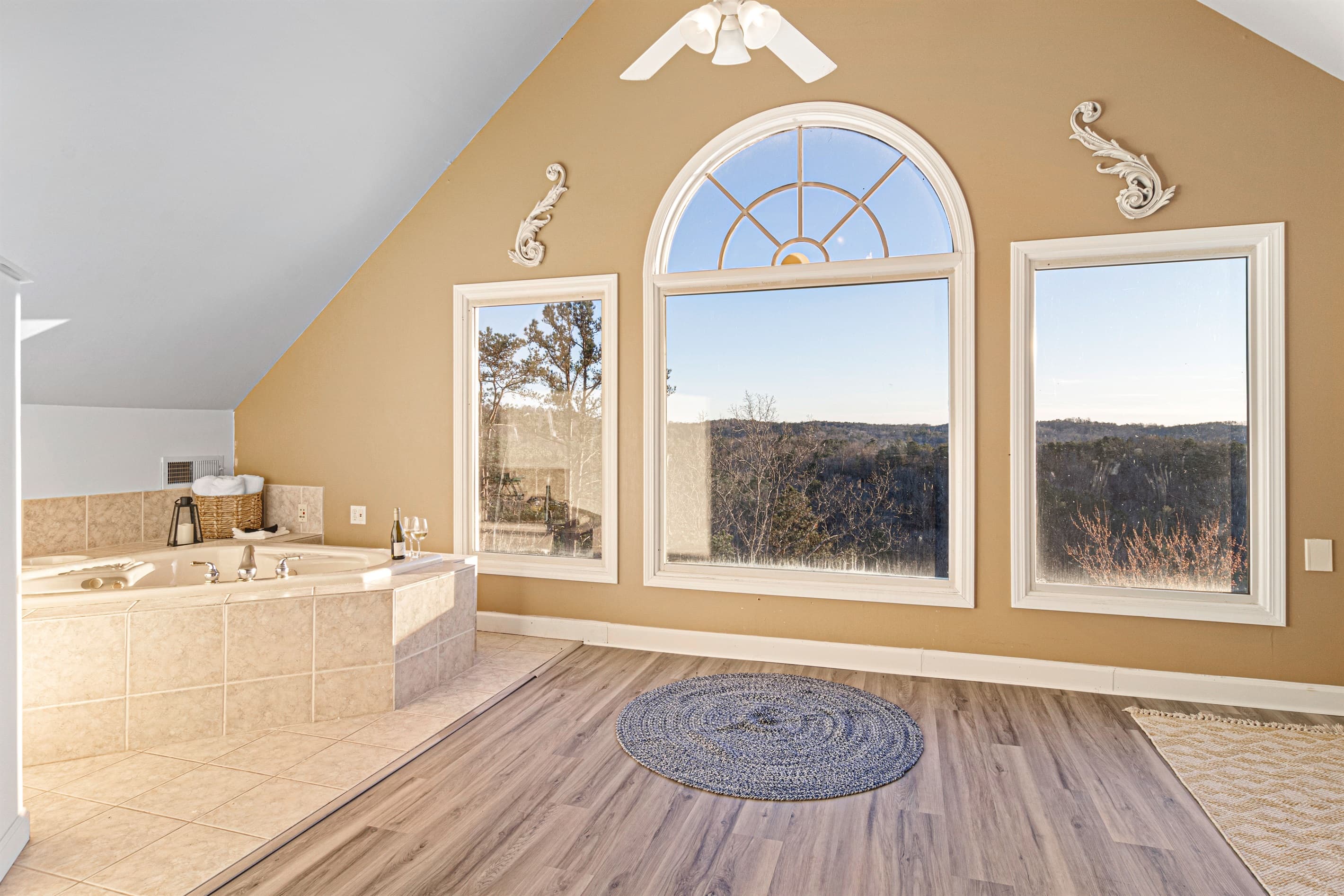 Master Suite: Soak in stunning views from your luxurious whirlpool tub! Serenity awaits.