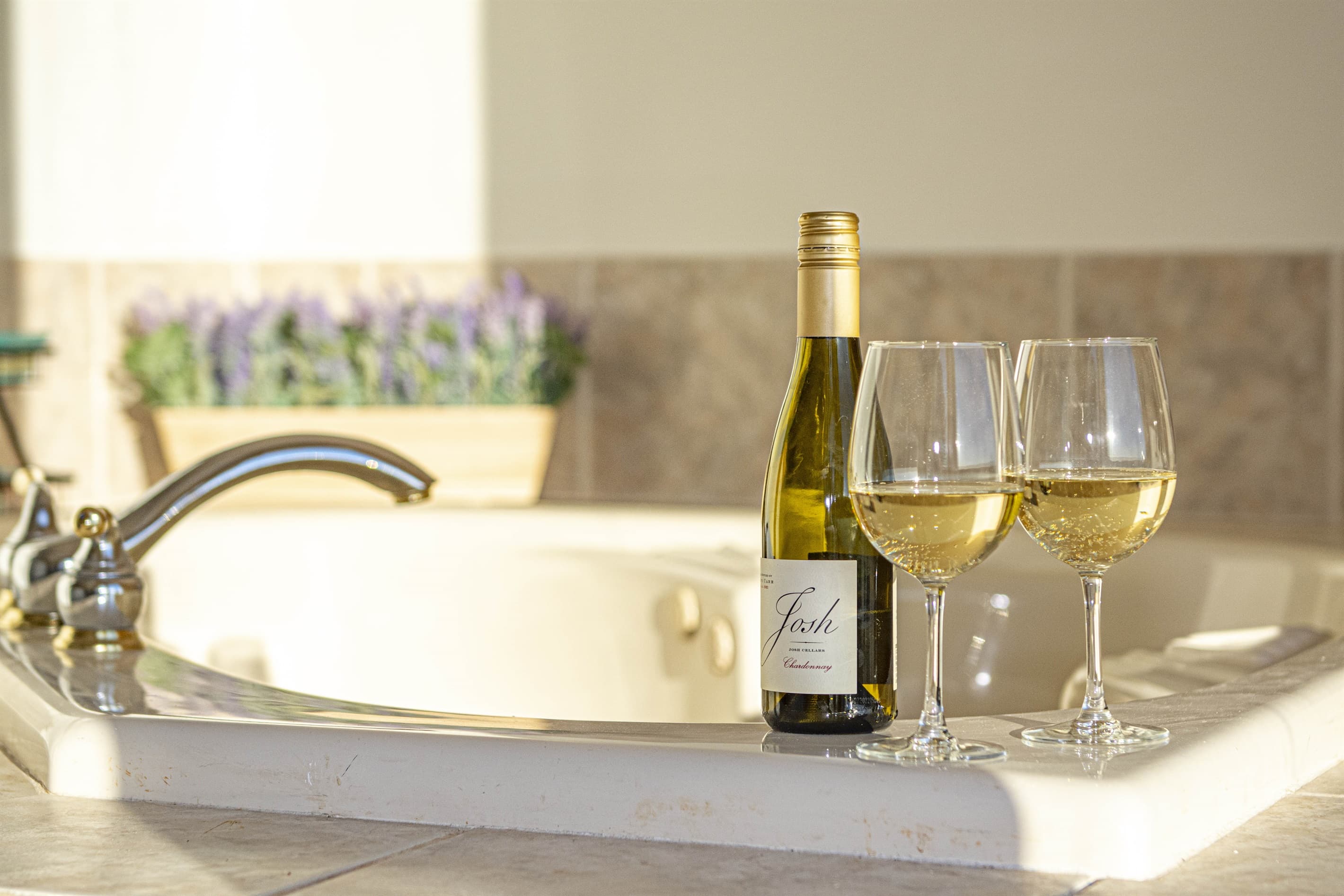 Private Spa Retreat: Indulge in relaxation with wine by the luxurious jetted tub!