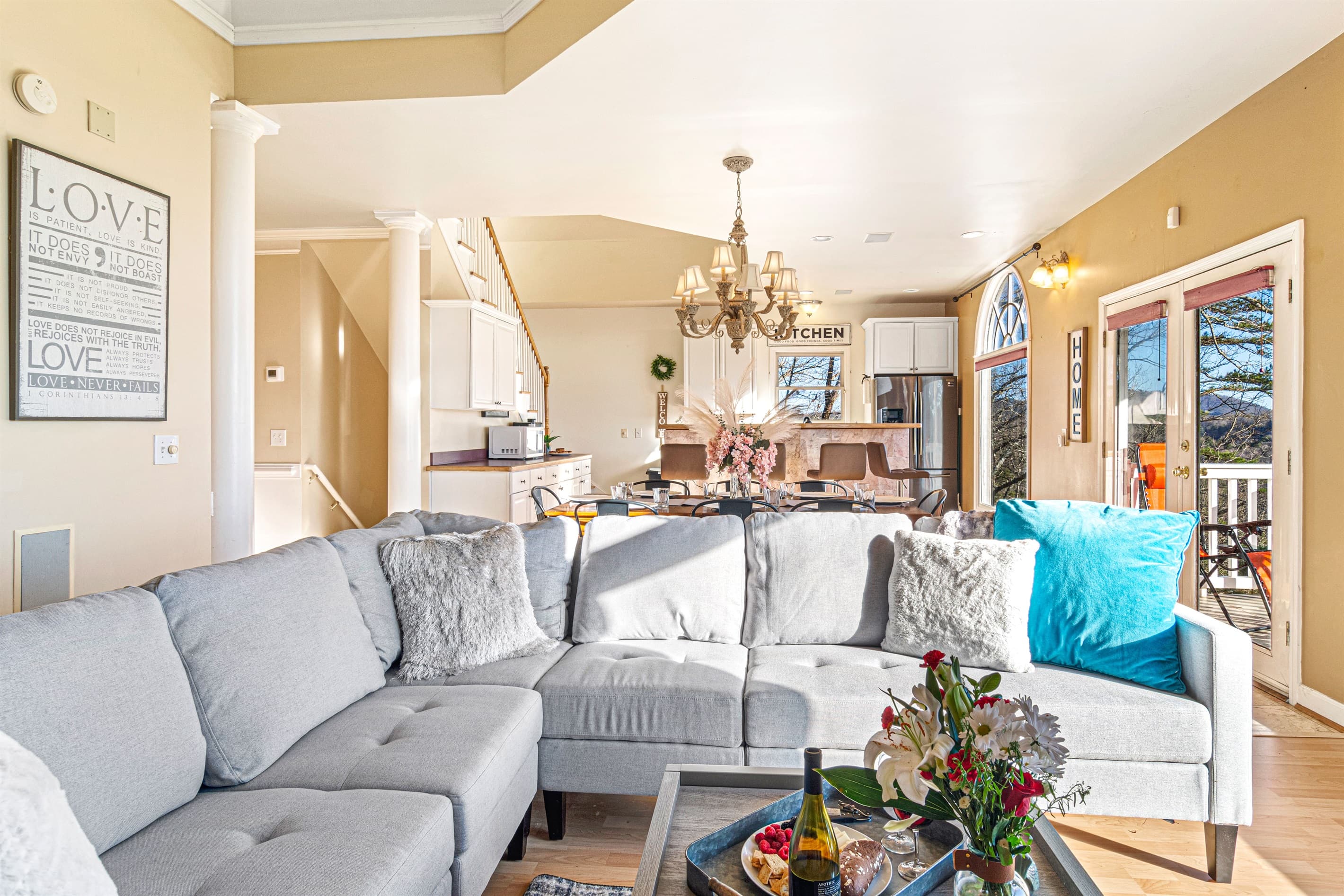 Living Room: Breathtaking views, plush seating, and a welcoming fireplace invite relaxation!