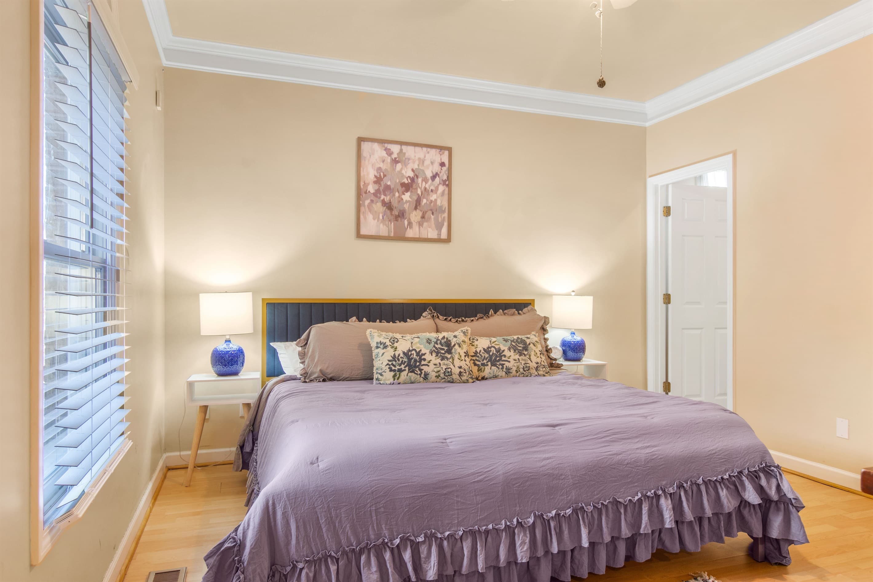 Another full suite on main floor with King bed ensuite bathroom. Suite Retreat: Elegant space with a plush King bed and beautiful natural light for your stay!
