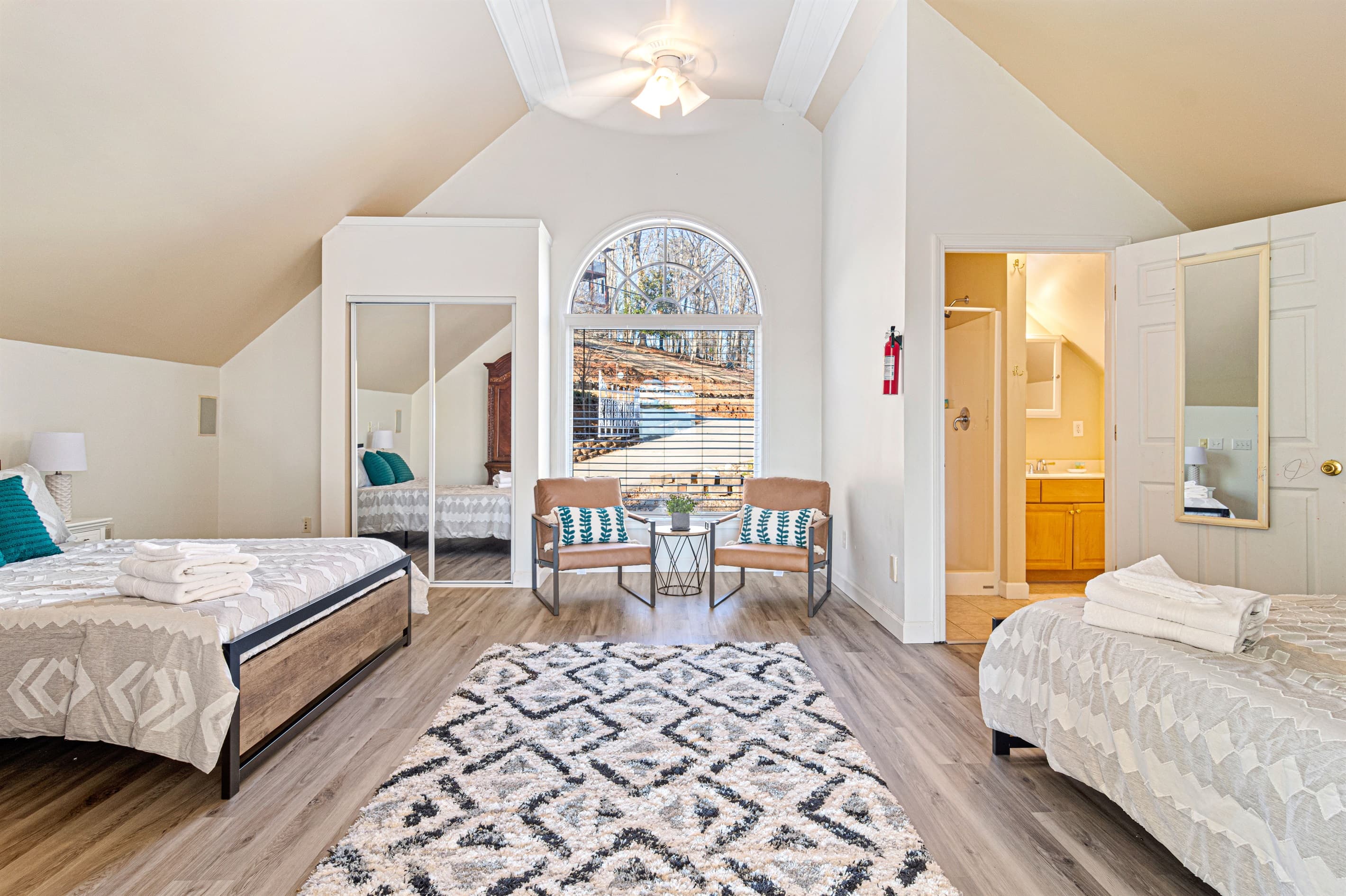 Upstairs Bedroom: Bright, airy retreat with dual queens and stunning nature views!