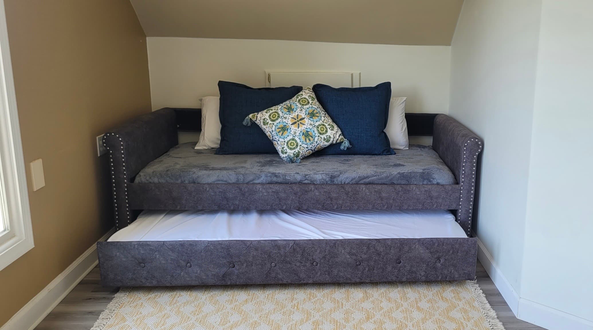 Trundle Bed Retreat: Stylish twin trundle bed, perfect for family fun and restful moments!
