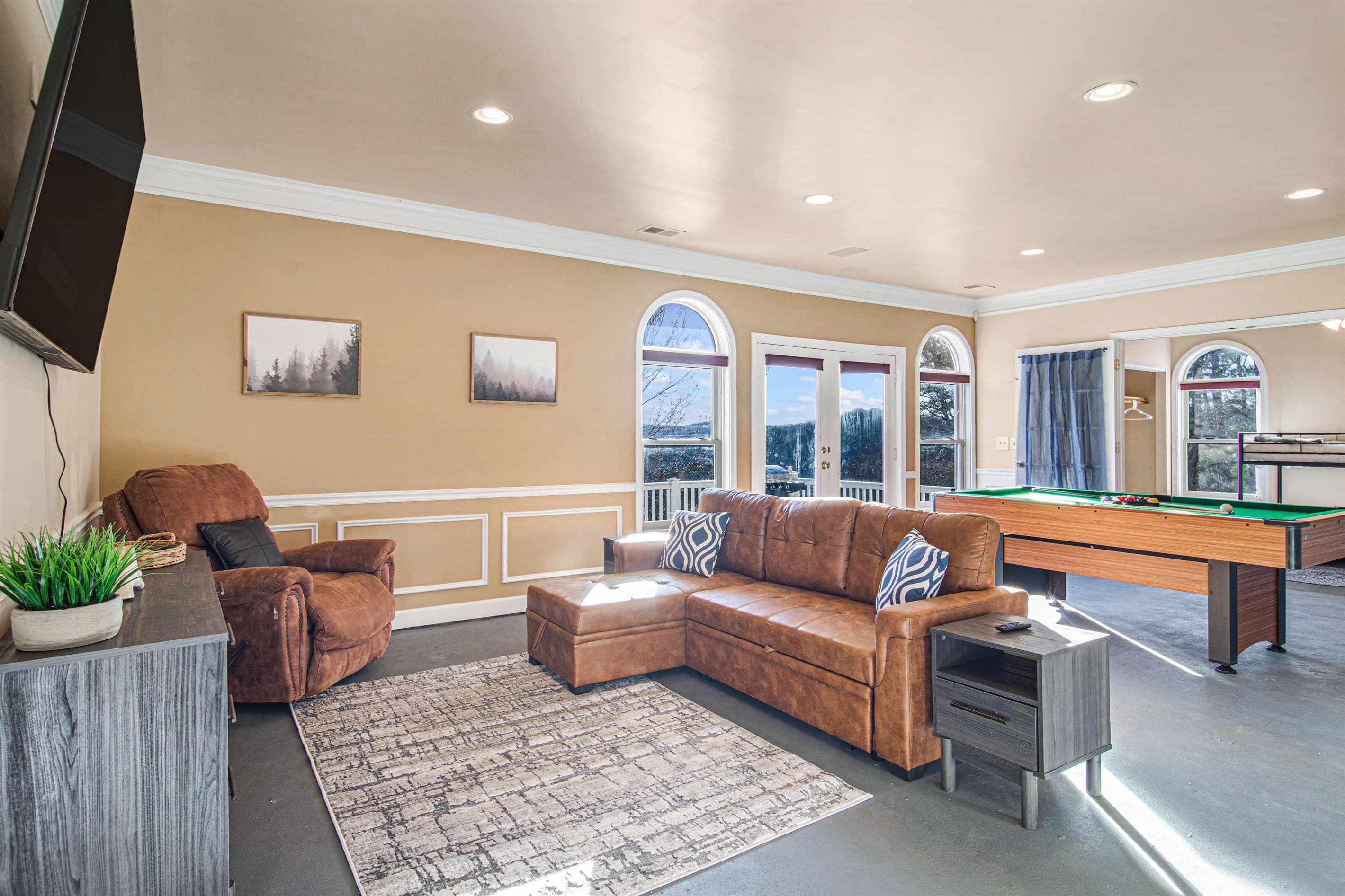 Recreation Room: Enjoy movie nights and game tournaments with stunning mountain views!