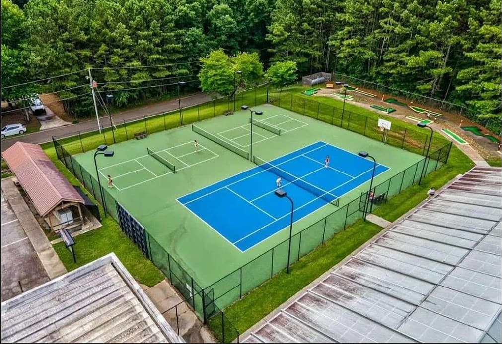Tennis Courts: Perfect your serve while surrounded by nature's beauty! Play and unwind.