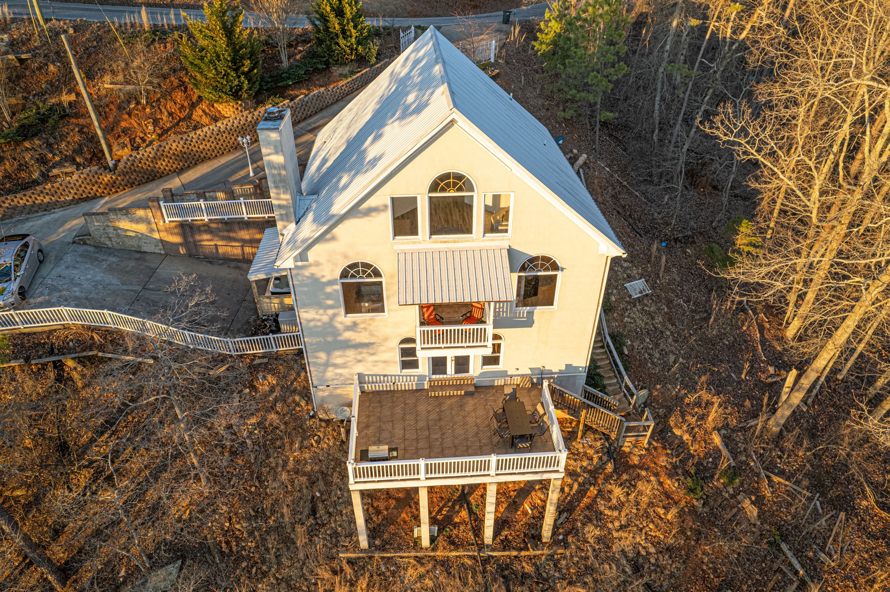 Parking available in driveway. Exterior Deck: Enjoy stunning views and alfresco dining on the spacious elevated deck!