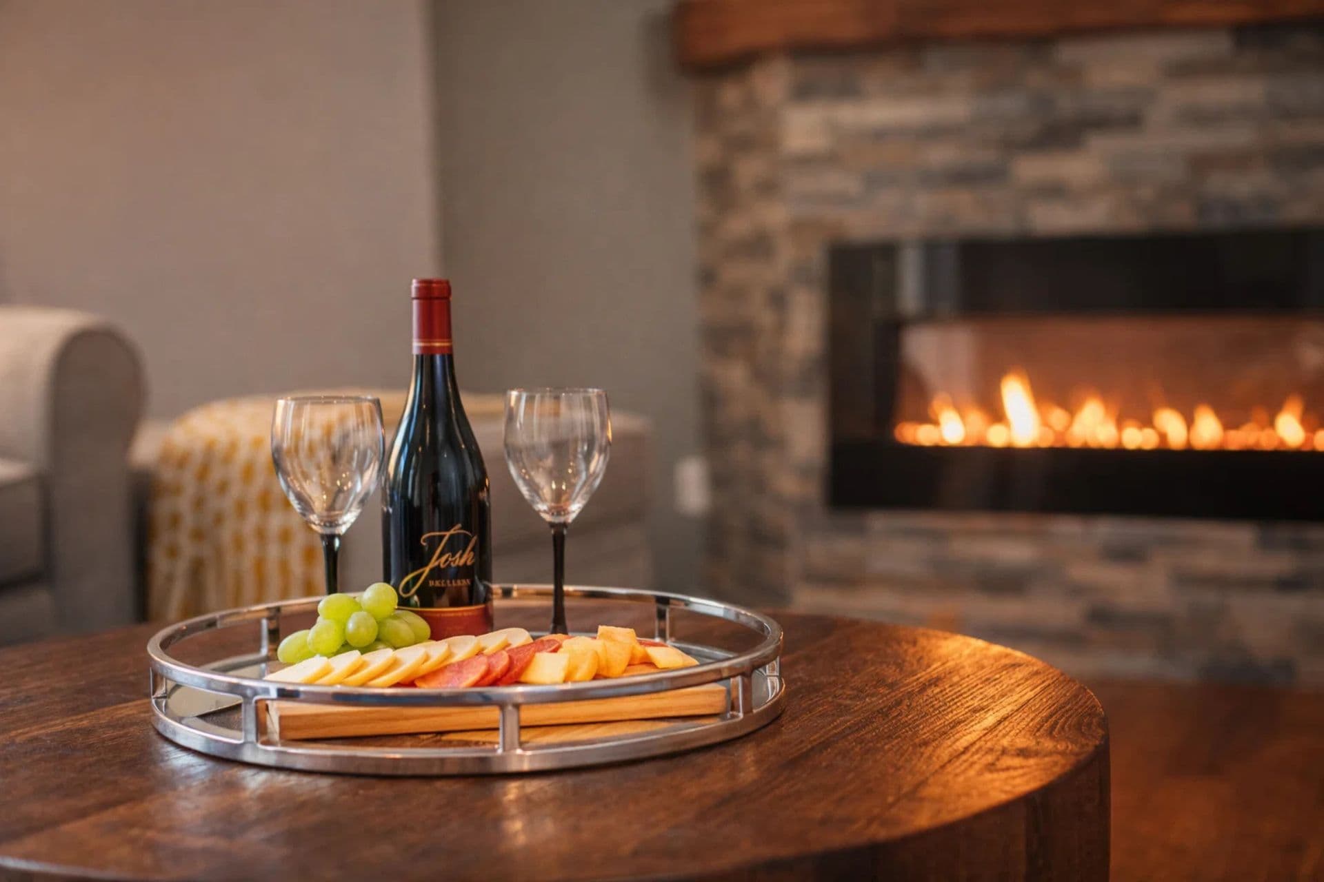 Living Room: Sip wine by the fireplace while enjoying a stunning spread of fresh fruit!