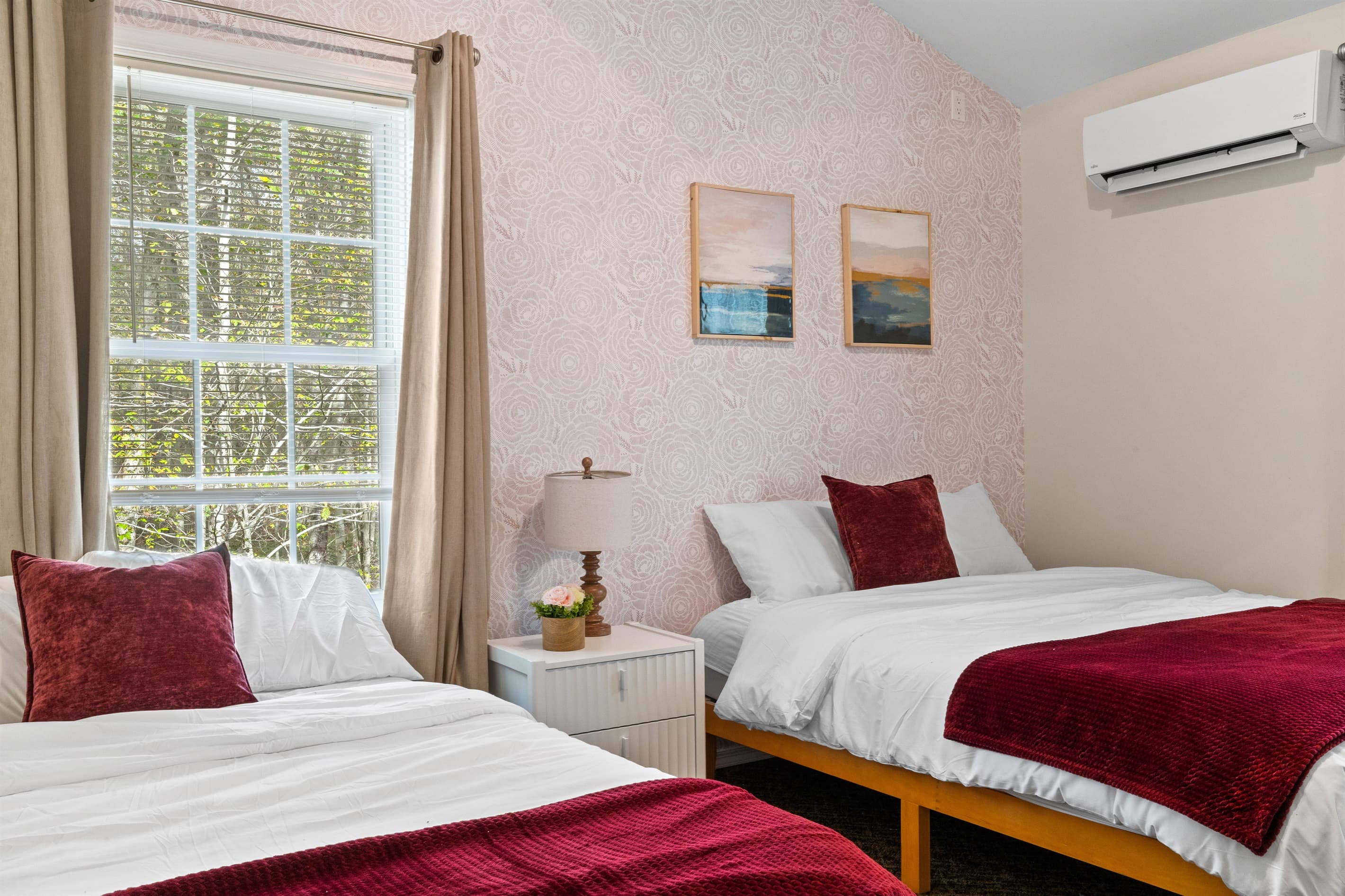 Charming Guest Room: Bright hues and nature views invite restful nights after day adventures!