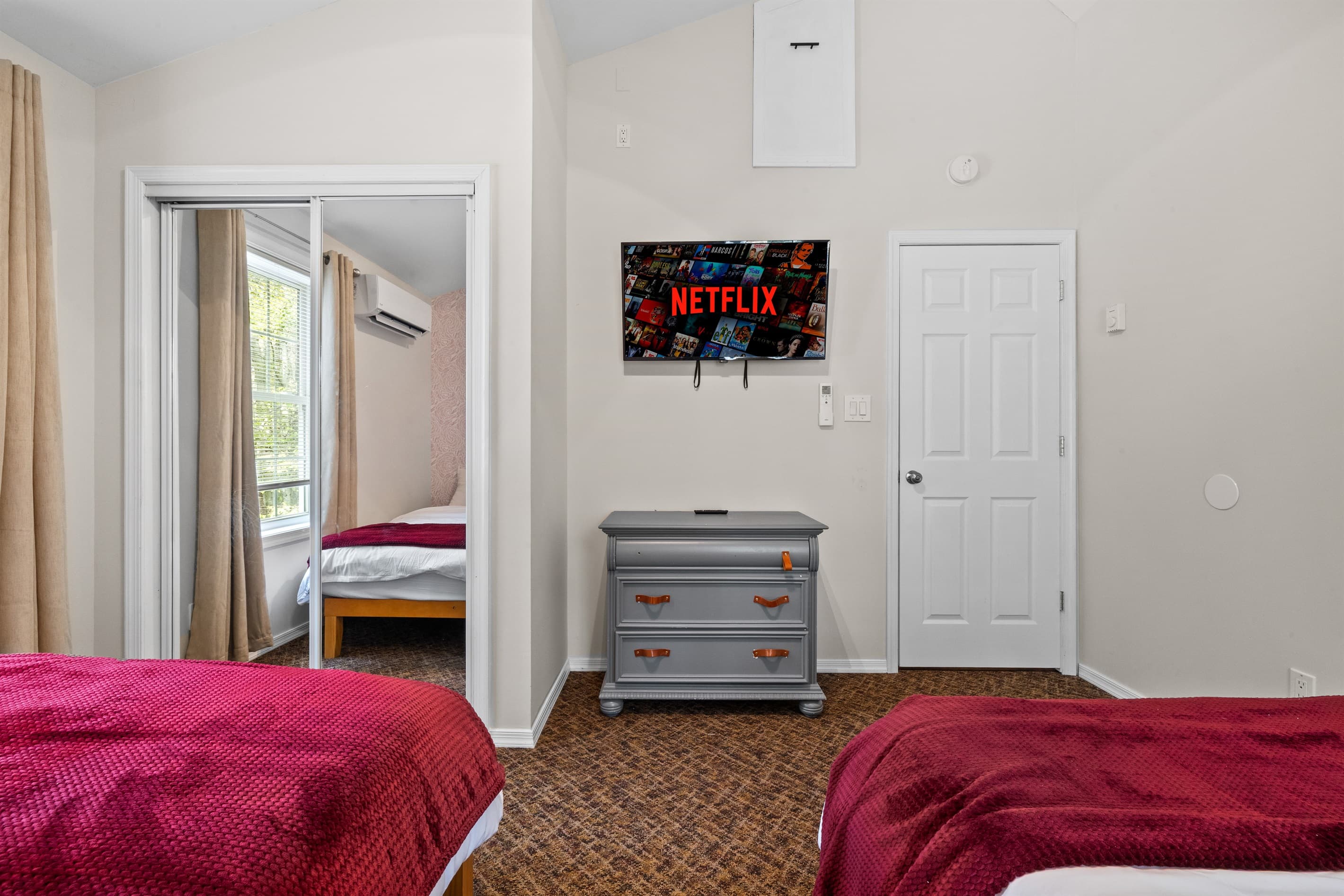 Bedroom: Relax and stream your favorite shows in this vibrant room with twin beds and great light!