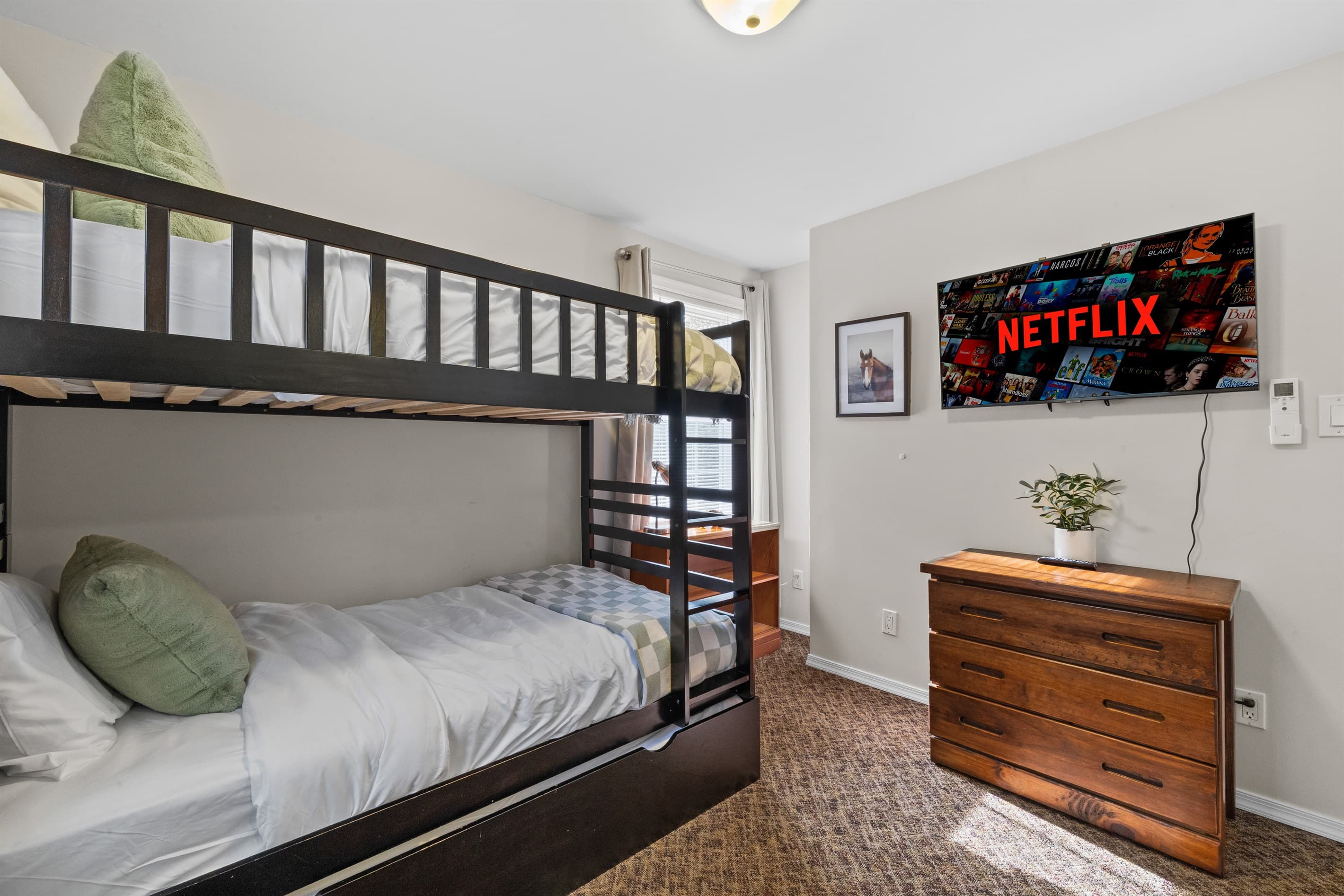 Bunk Room: Fun-filled nights await with stylish bunks and Netflix right at your fingertips!