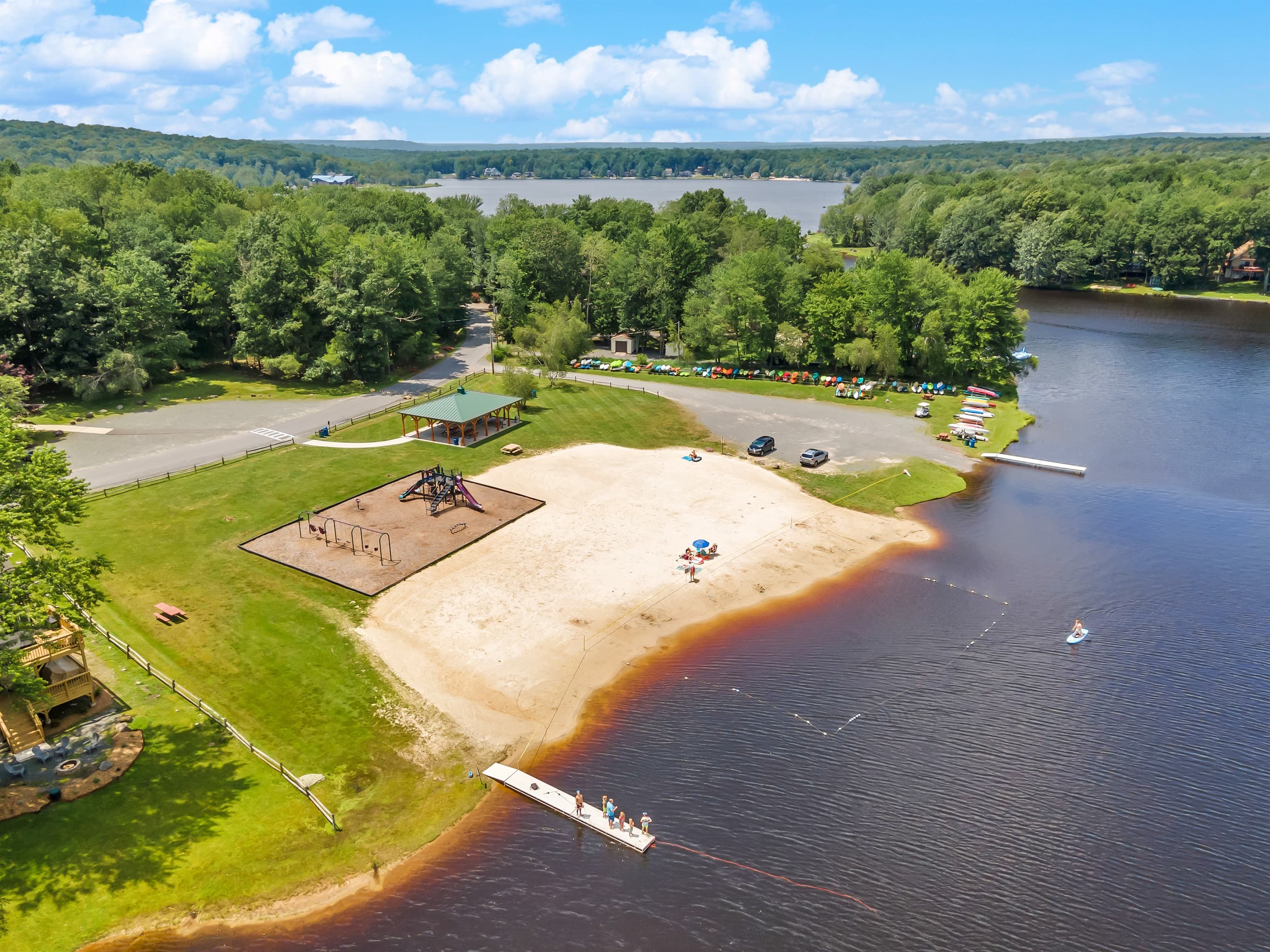Outdoor Oasis: Enjoy sun-soaked days at the sandy beach, playground, and scenic lake views!