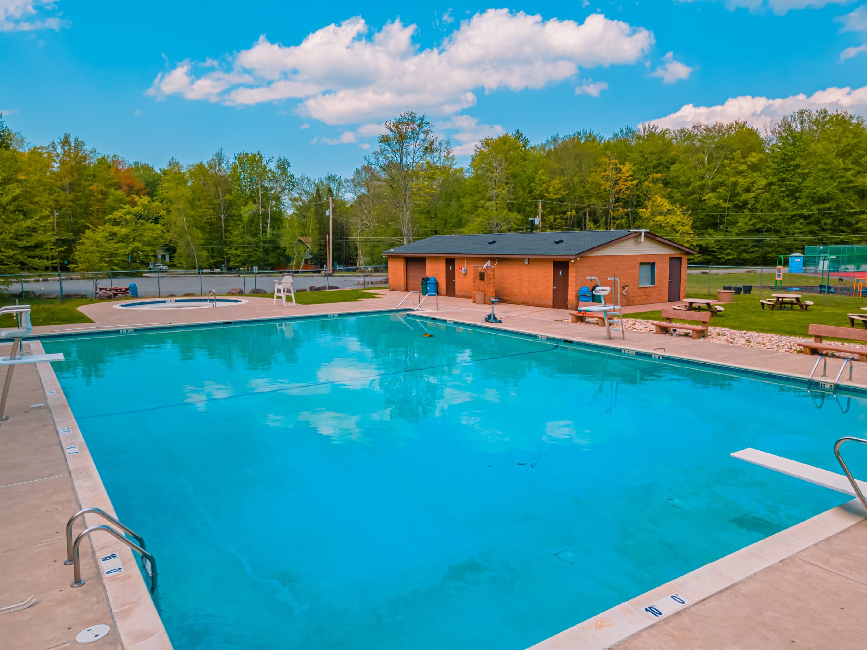 Outdoor Oasis: Dive into fun at our sparkling pool surrounded by nature and relaxation!