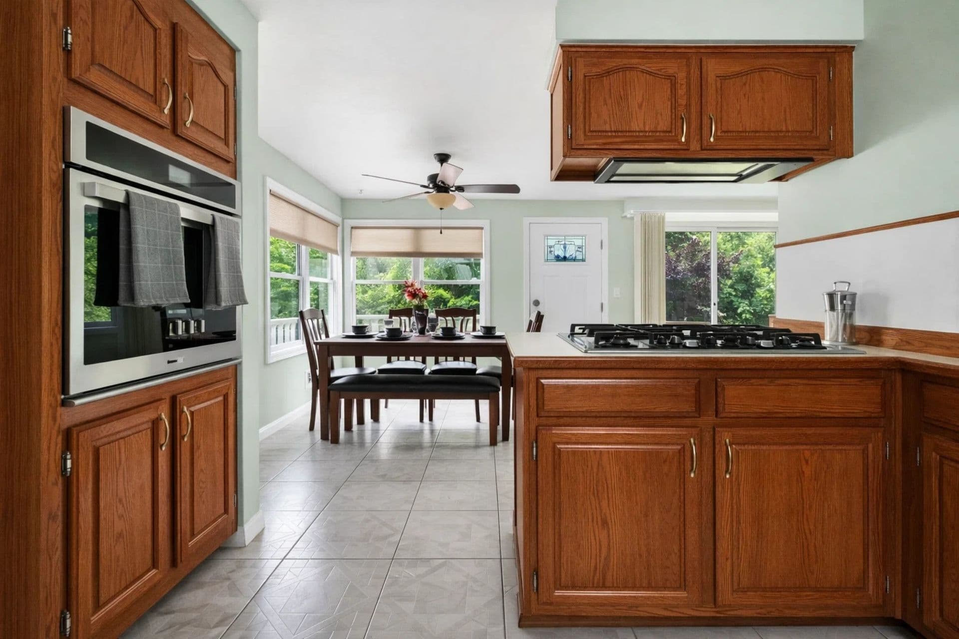 Bright and airy open kitchen layout seemlessly blending cooking and dining spaces