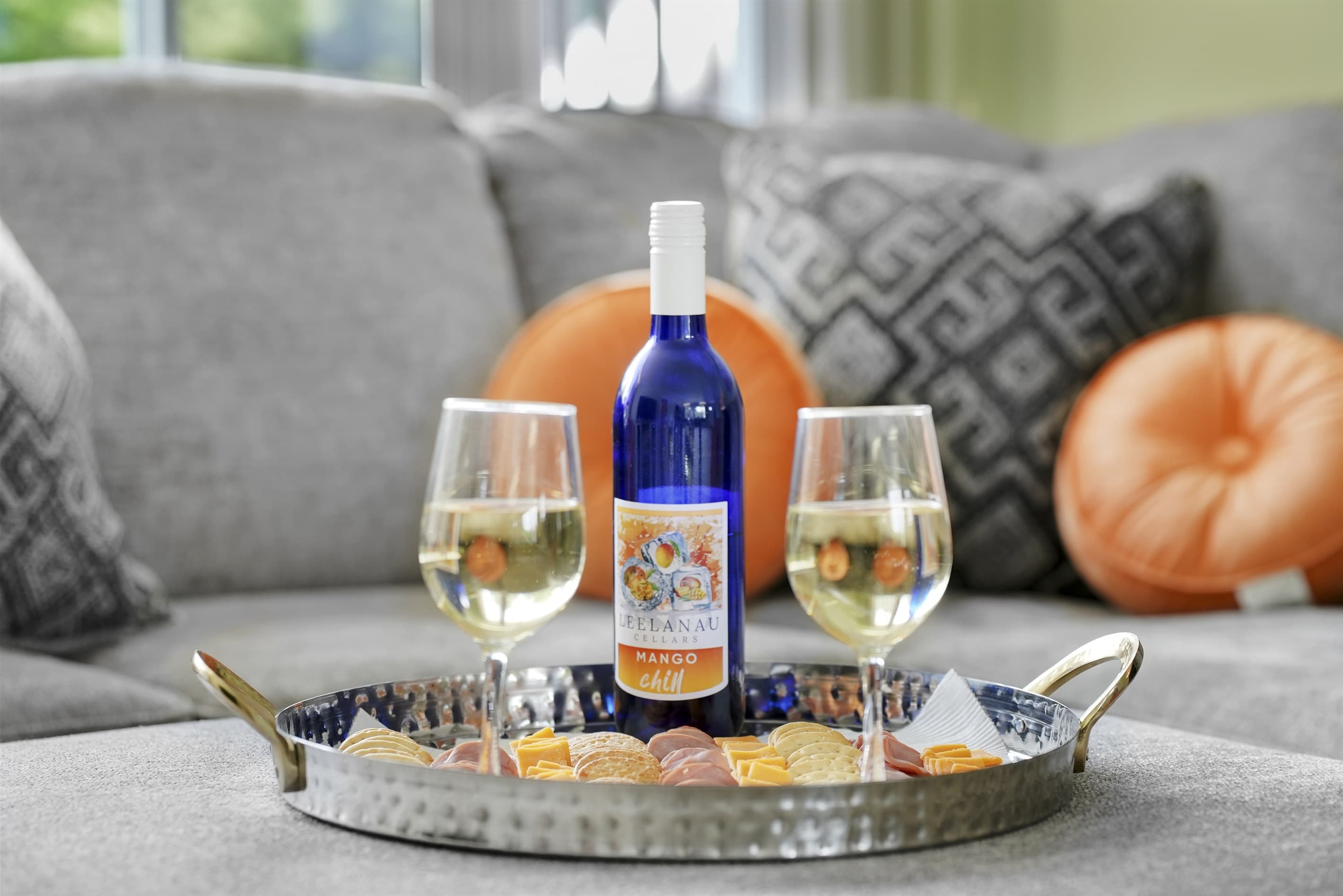 Living Room Retreat: Savor local wine and snacks in a stylish haven with vibrant accents!