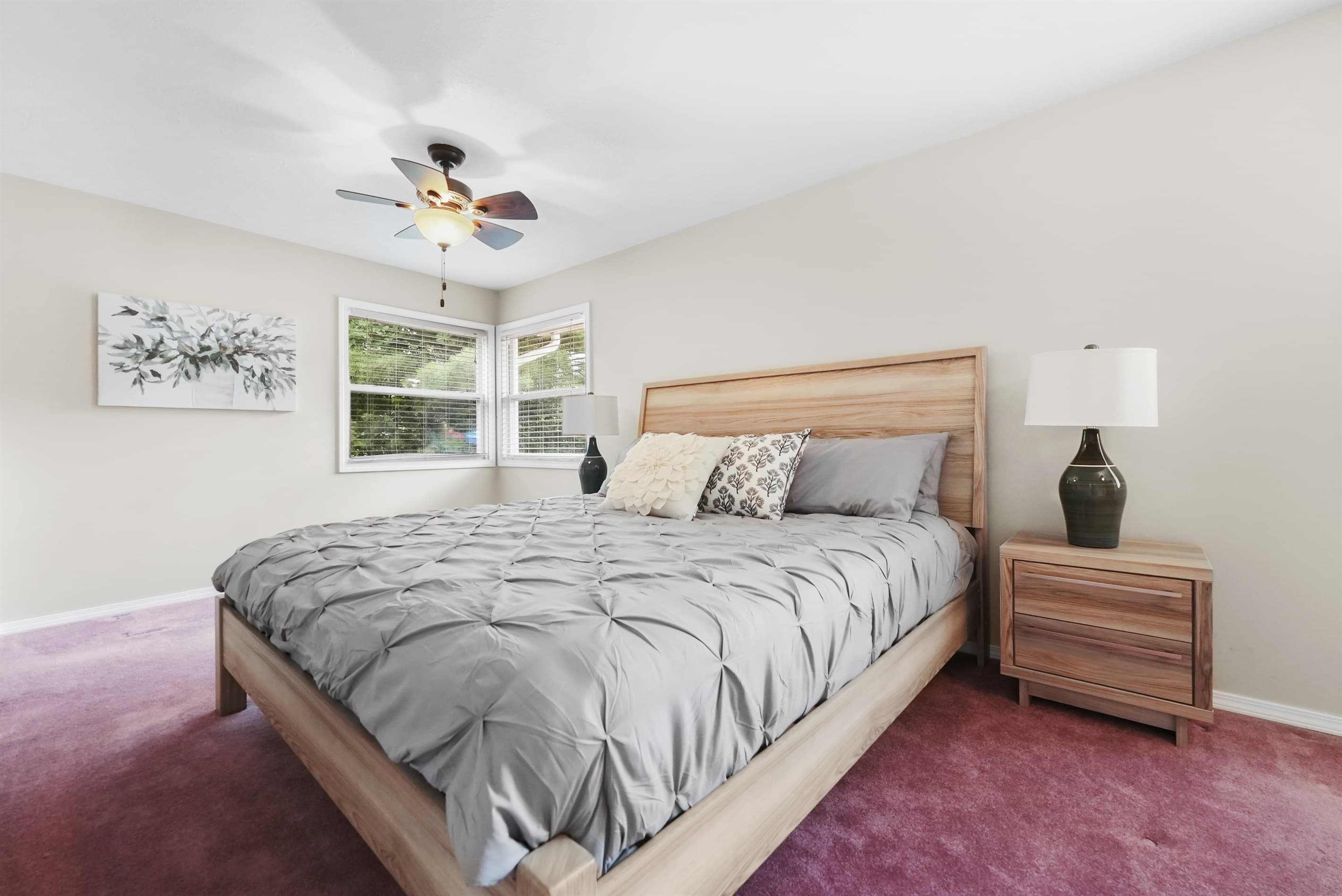 Spacious master bedroom with a king sized bed, designed for ultimate comfort and relaxation