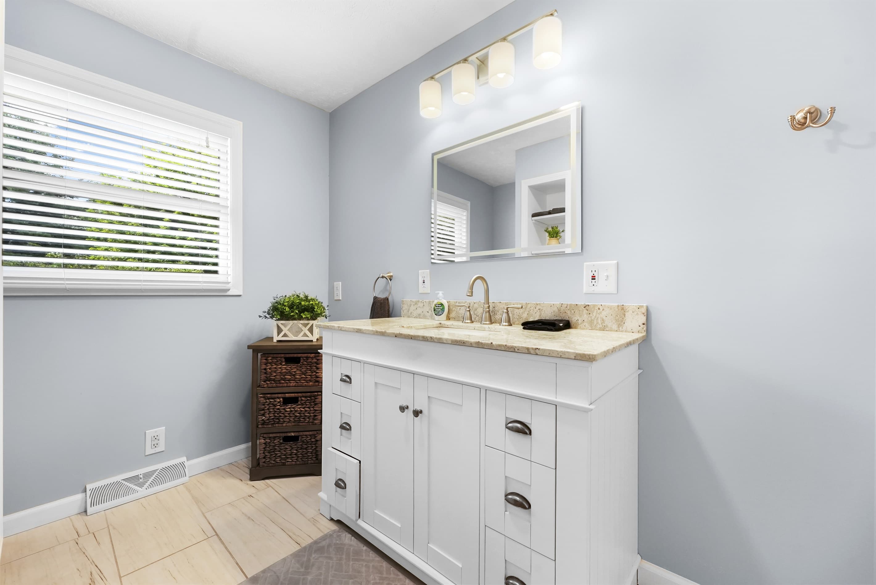 Full Bathroom: Bright and airy space with stylish fixtures, perfect for freshening up after adventures!