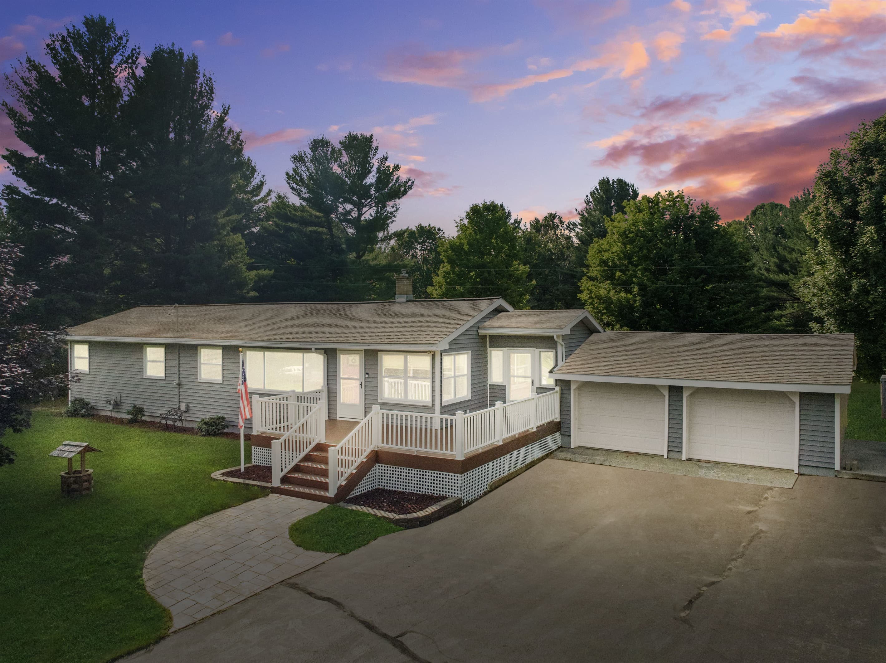 Exterior Oasis: Experience serene evenings on the spacious deck, surrounded by nature's beauty!