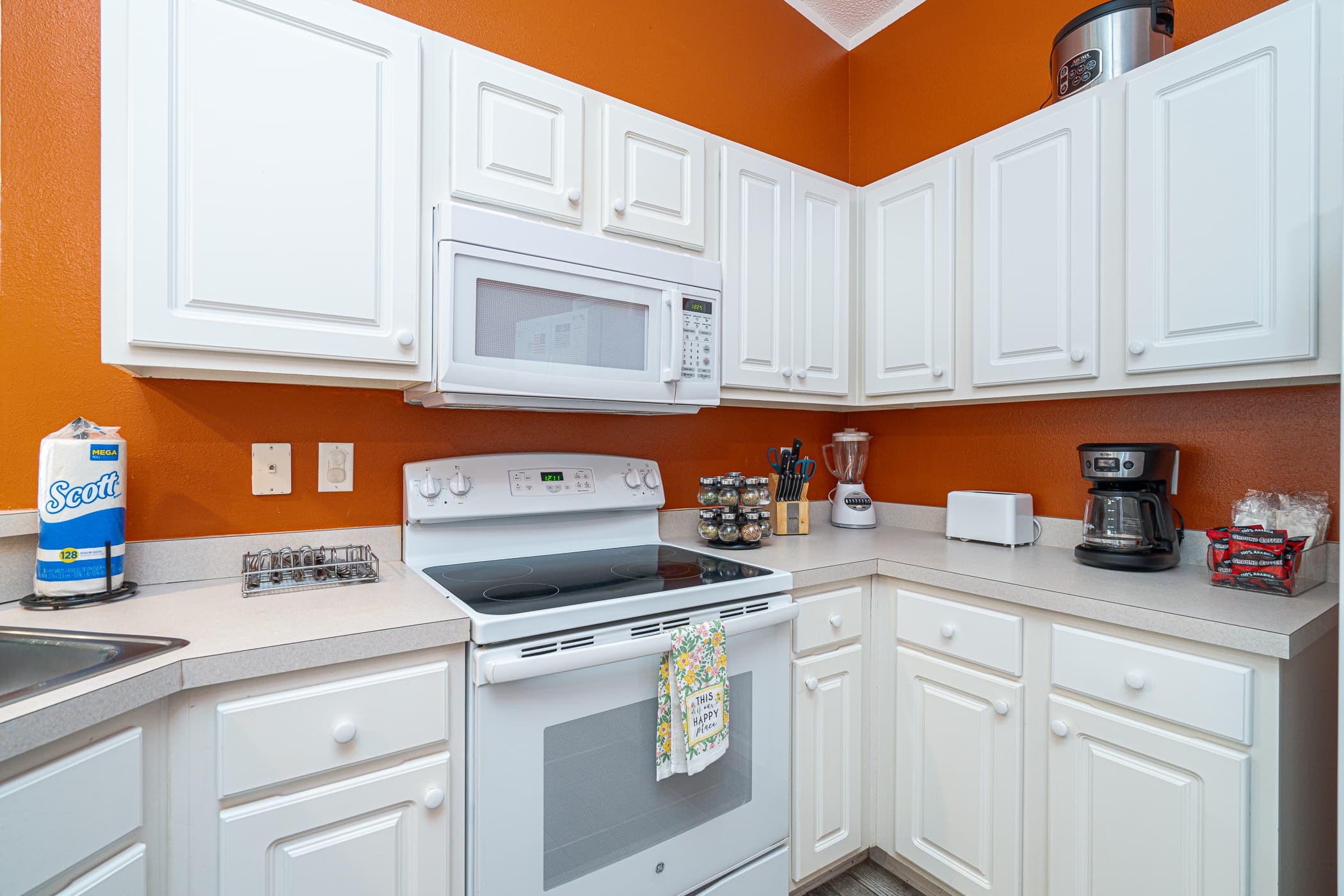 Kitchen Delight: Cook up memories in a bright, fully stocked kitchen with modern appliances!