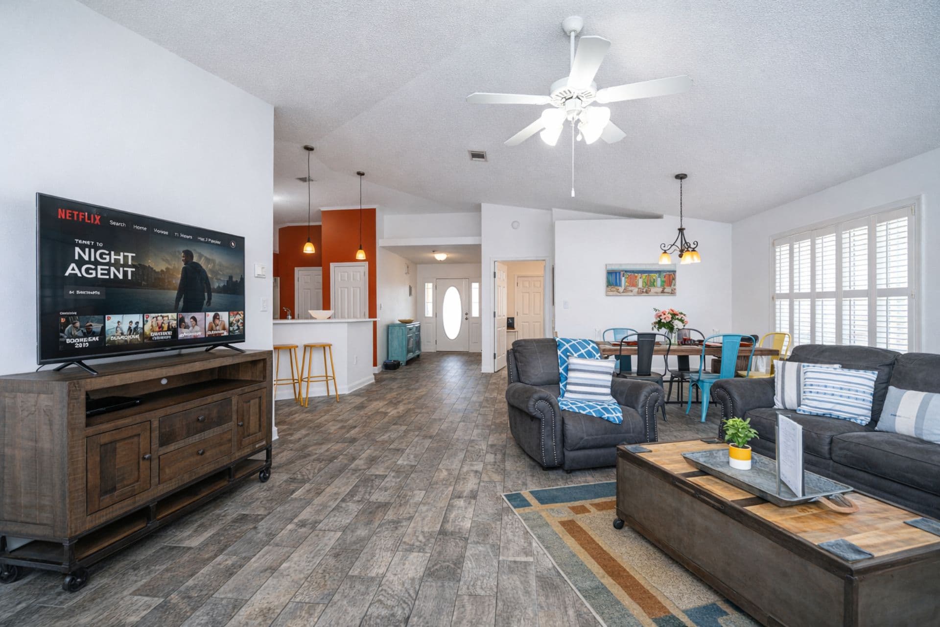 Living Room: Sun-soaked space with vibrant decor, perfect for relaxation and fun gatherings!