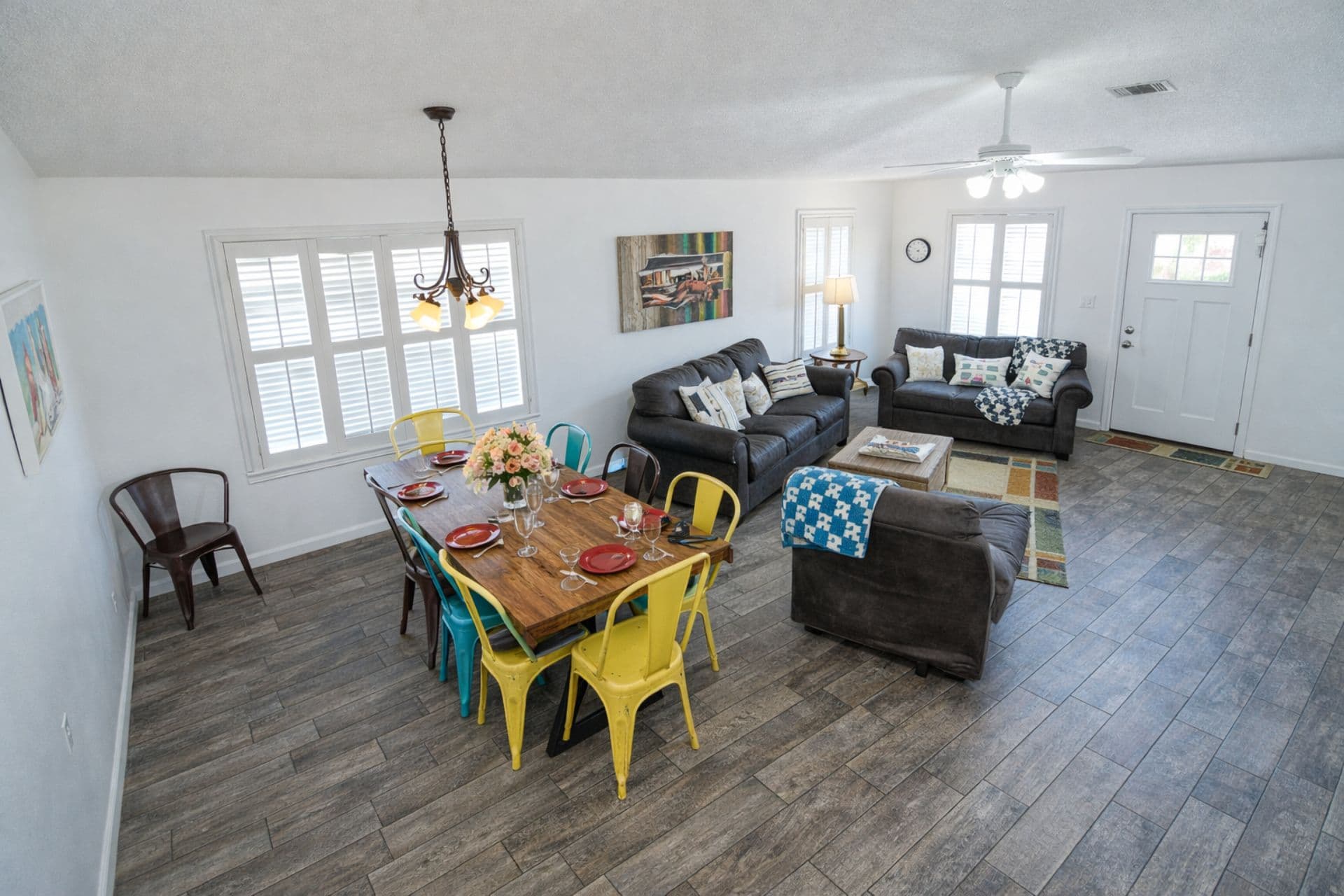 Dining & Living Area: Vibrant decor and sunny views make every meal a celebration!