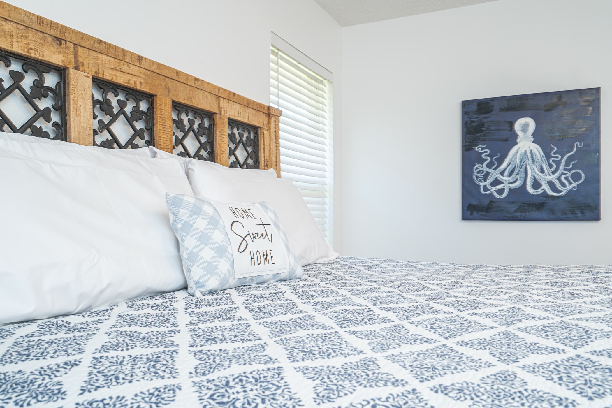 Bedroom with King Bed and Flat TV Screen. Bedroom Retreat: Elegant decor, plush bedding, and sunlit charm for a perfect Destin getaway!