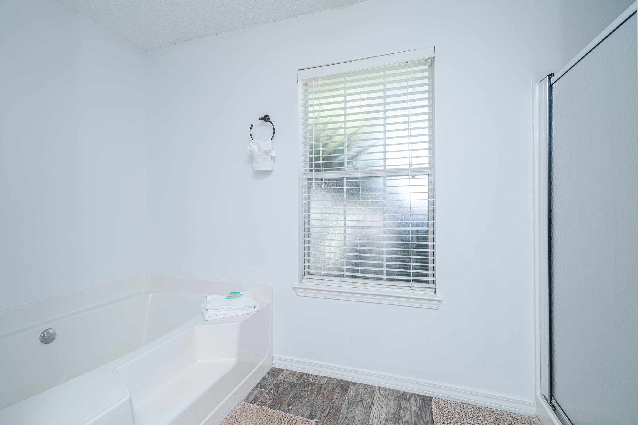 Jacuzzi tub with separate standing shower