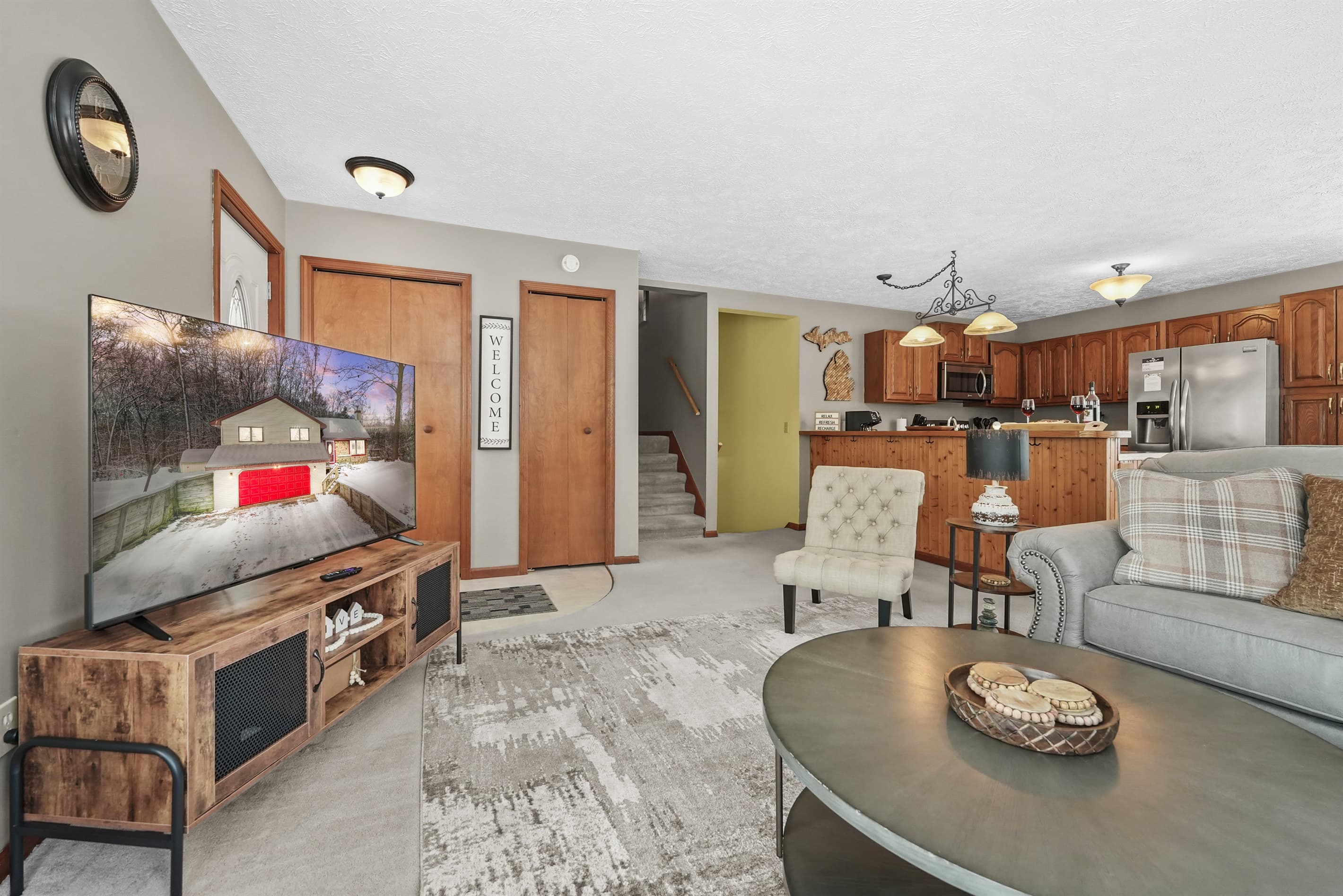 Living Room: Relax and unwind in style with stunning views and modern decor! Perfect for gathering!