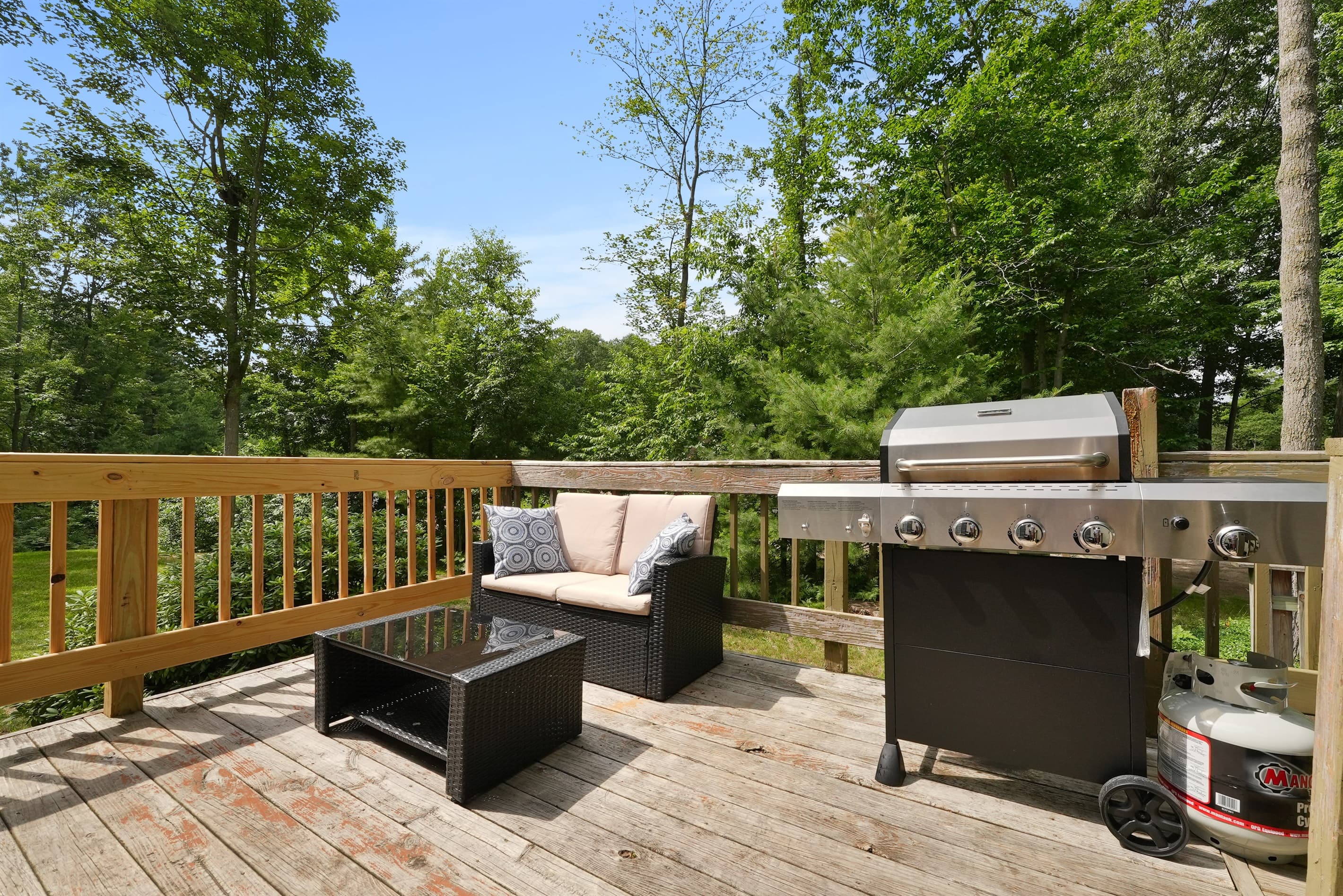 Deck Paradise: Enjoy grilling and relaxing in nature’s embrace on this serene private deck!
