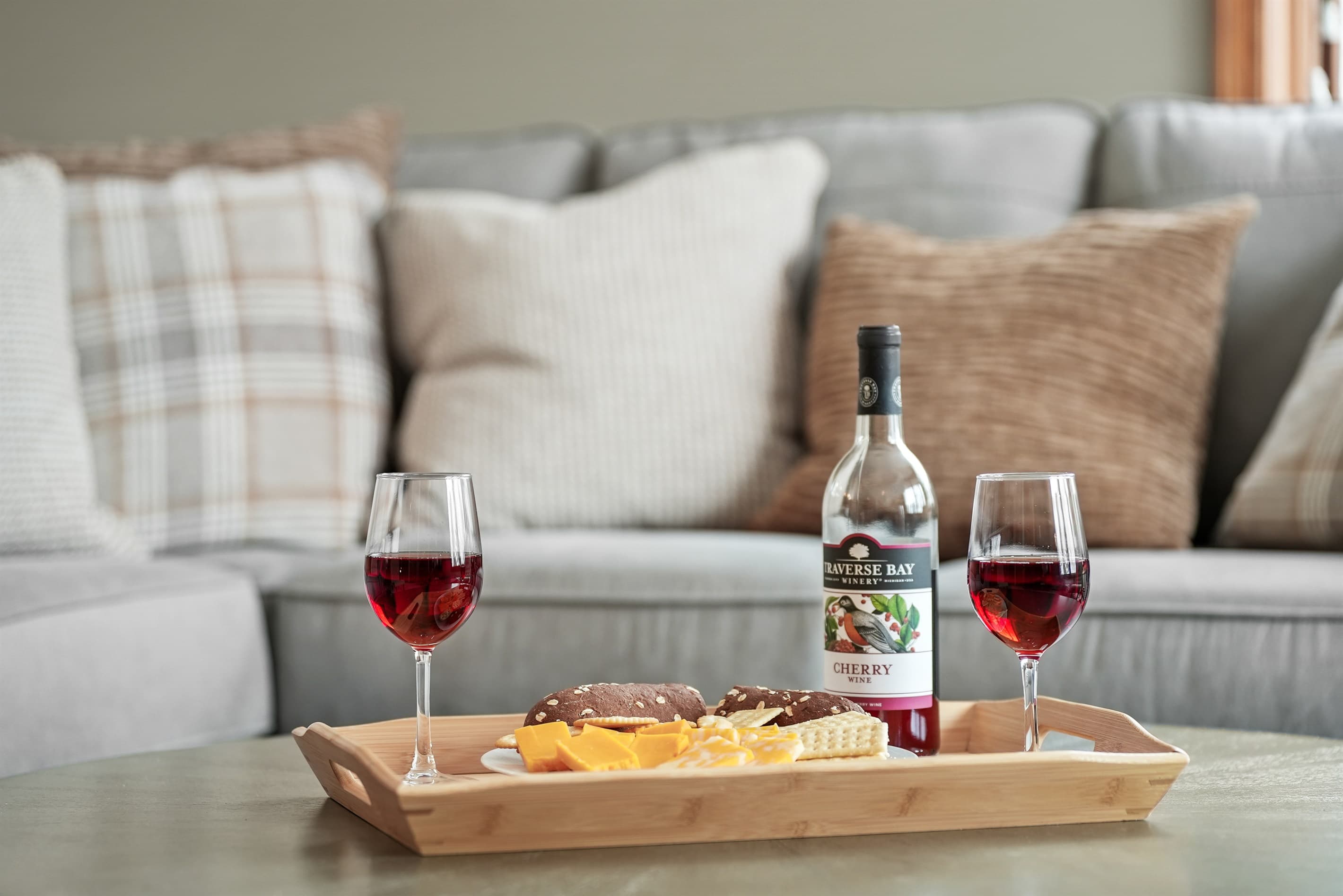 Living Room: Sip cherry wine and savor gourmet treats in a stylish retreat!