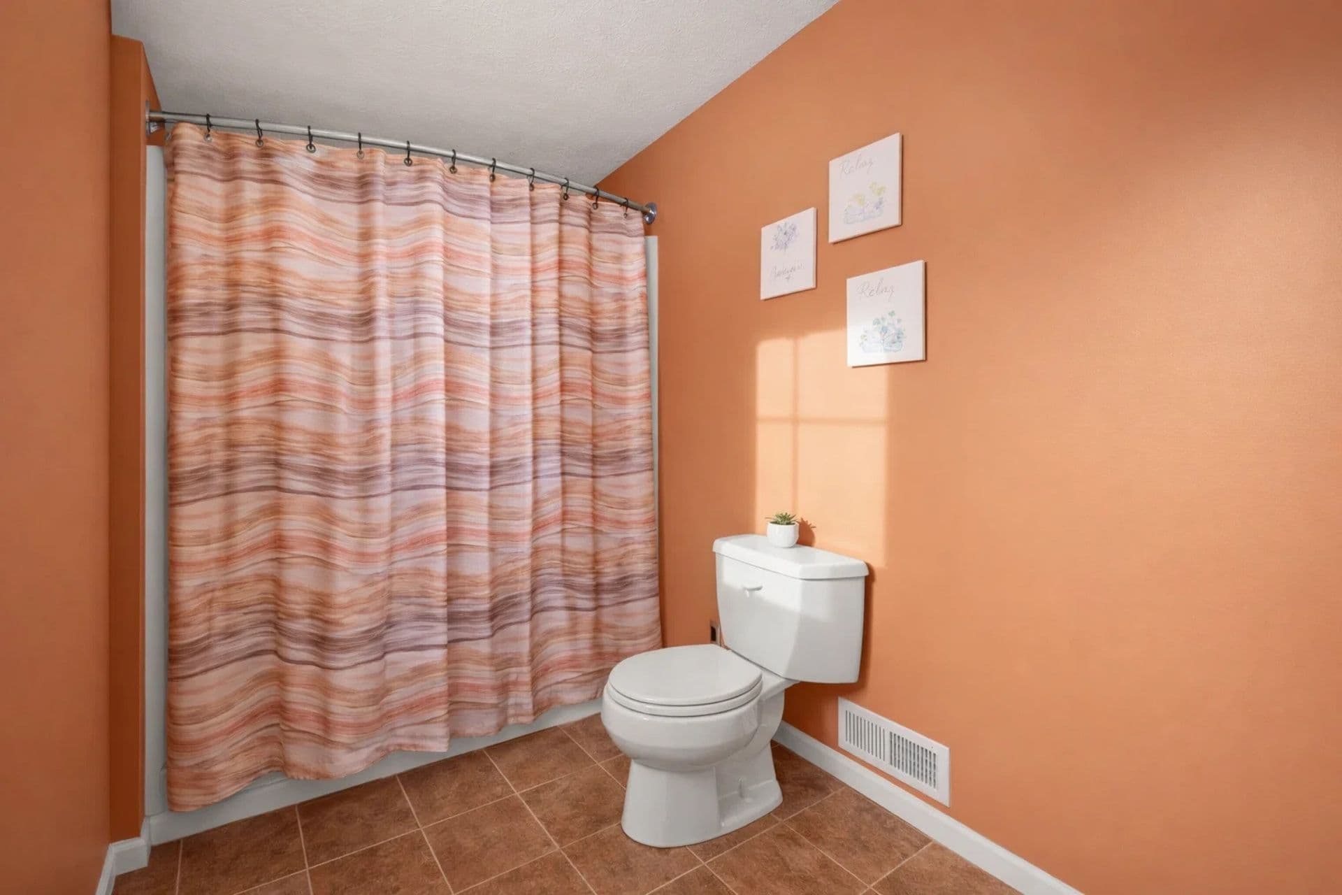 Spa-Like Full Bathroom: Bright decor and modern fixtures for your refreshing retreat!