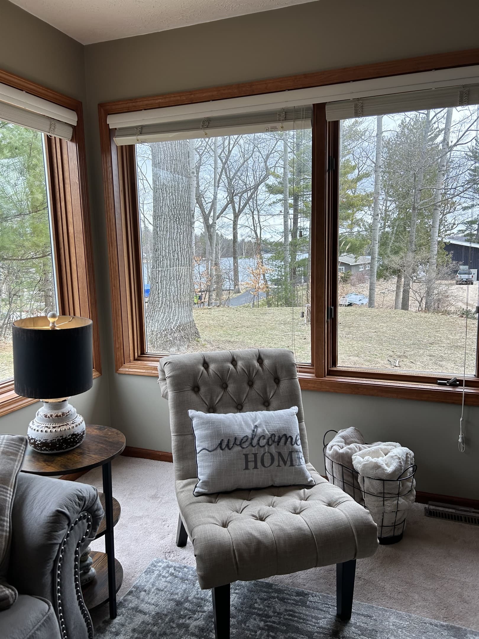 Sunlit Living Room: Enjoy tranquil lake views from this inviting space, perfect for relaxation!