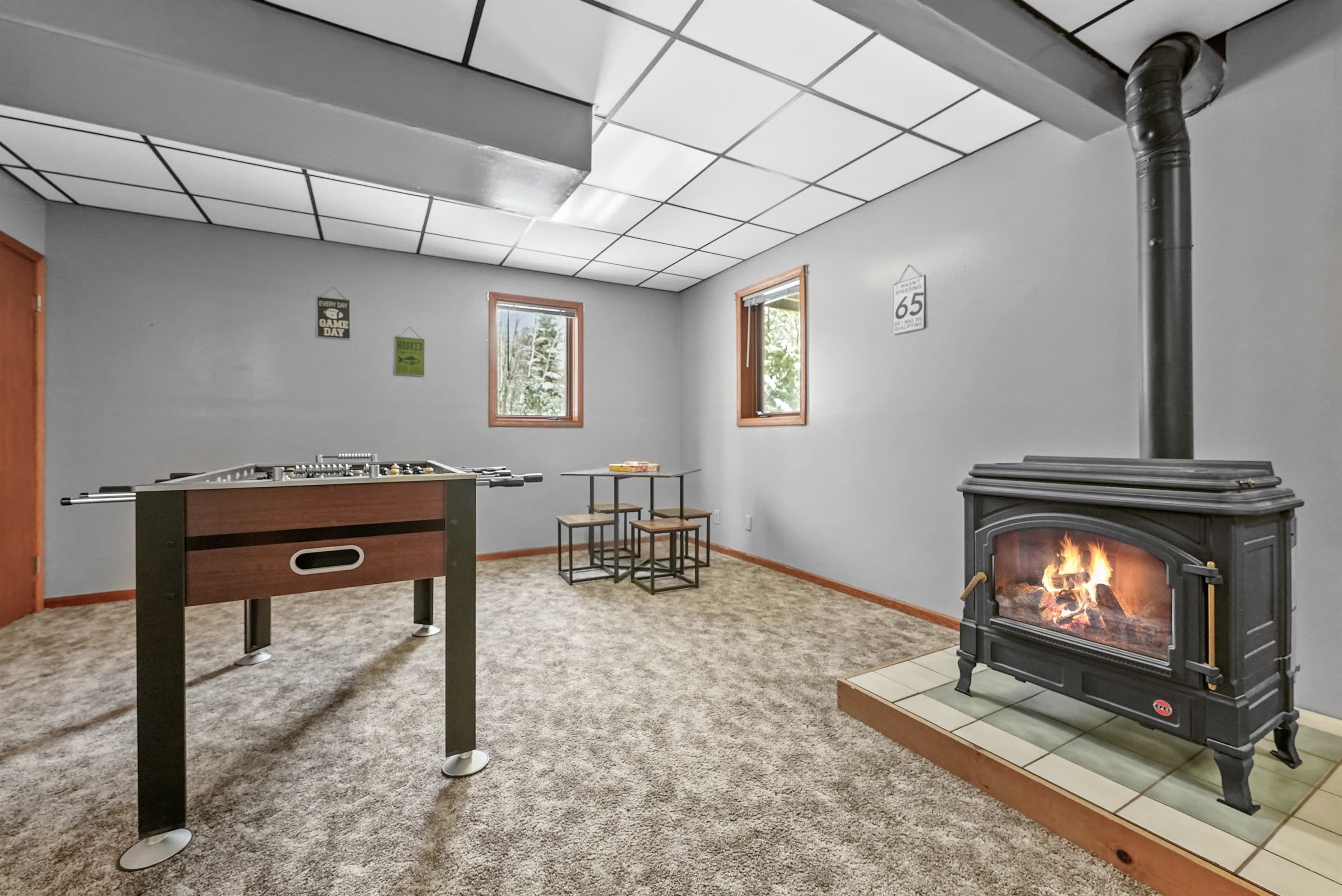 Game Room: Unwind with foosball, games, and a warm fireplace—perfect for fun-filled evenings!