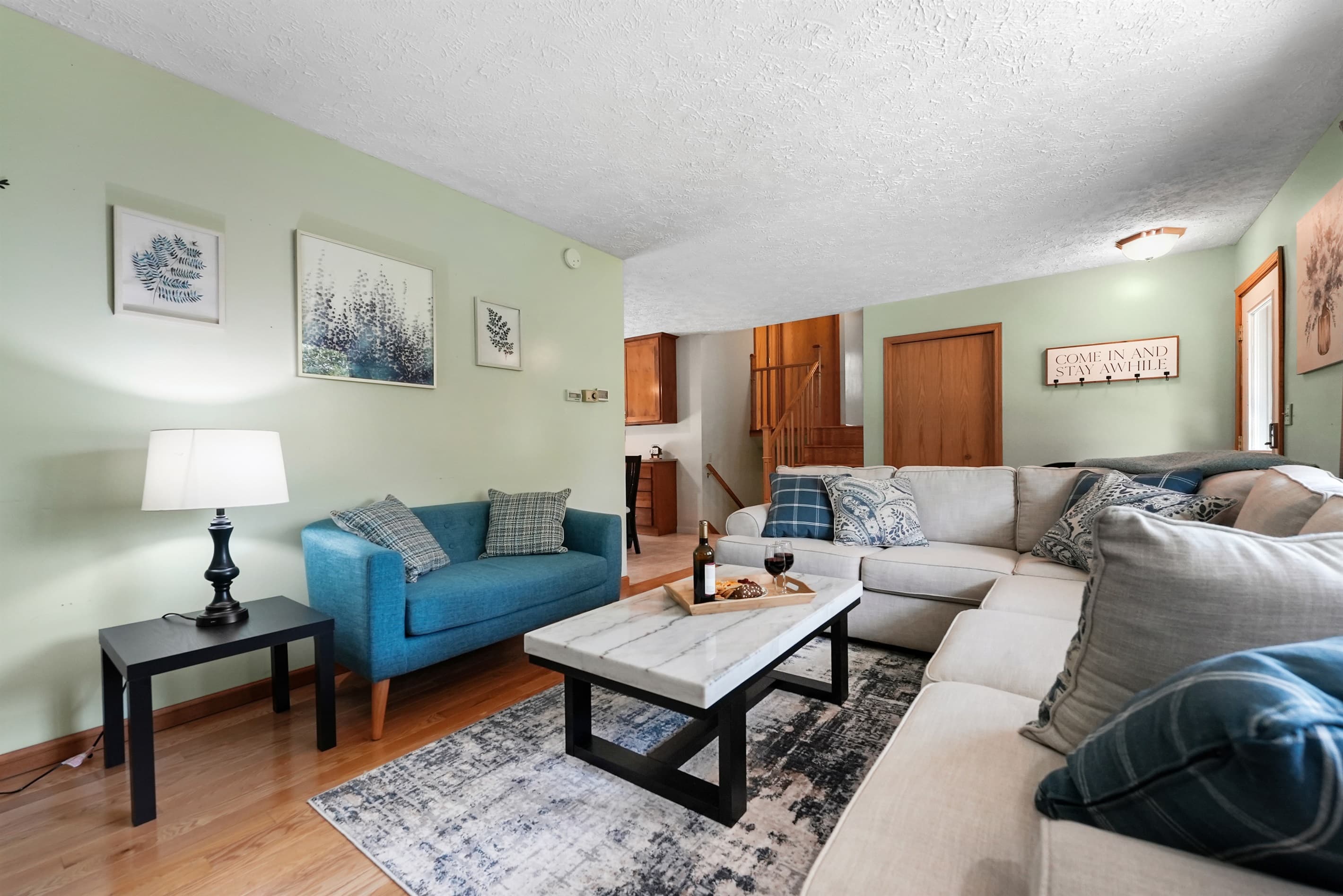 Living Room: Unwind in style amidst vibrant decor and plush seating—perfect for memorable evenings!