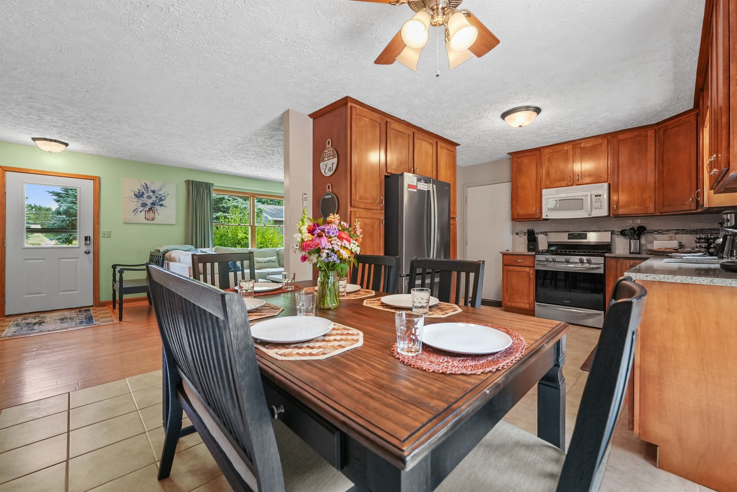 Dining Area: Gather 'round the spacious table, let the sun in, and create lasting memories!