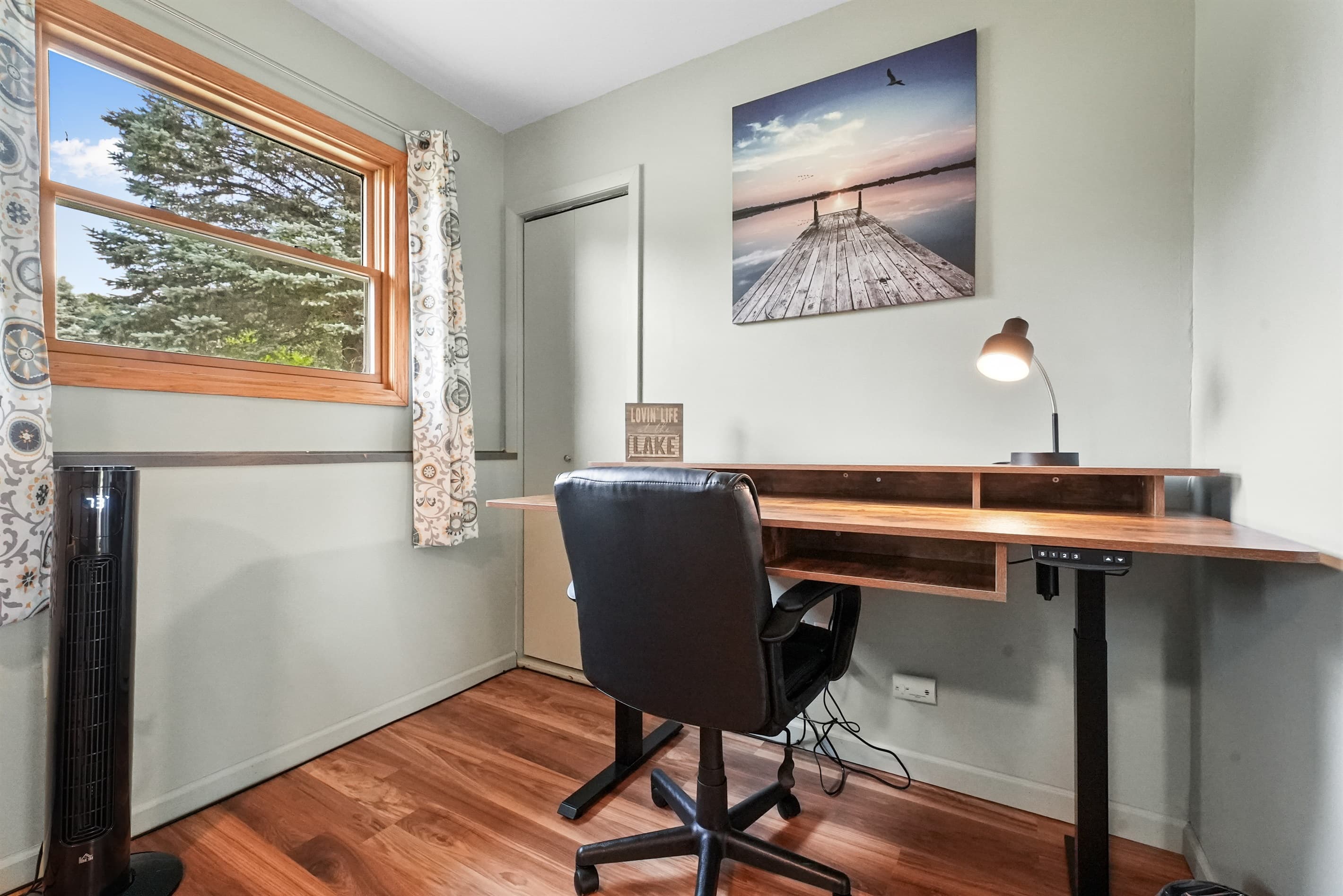 Office Space: Bright desk area with lake views—perfect for productivity and inspiration!