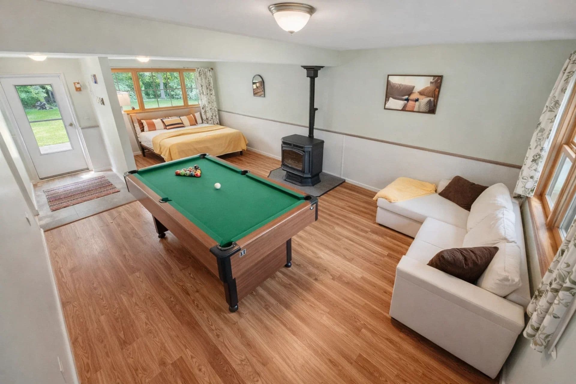 Game Room: Delight in fun-filled nights with a pool table and views of nature outside!