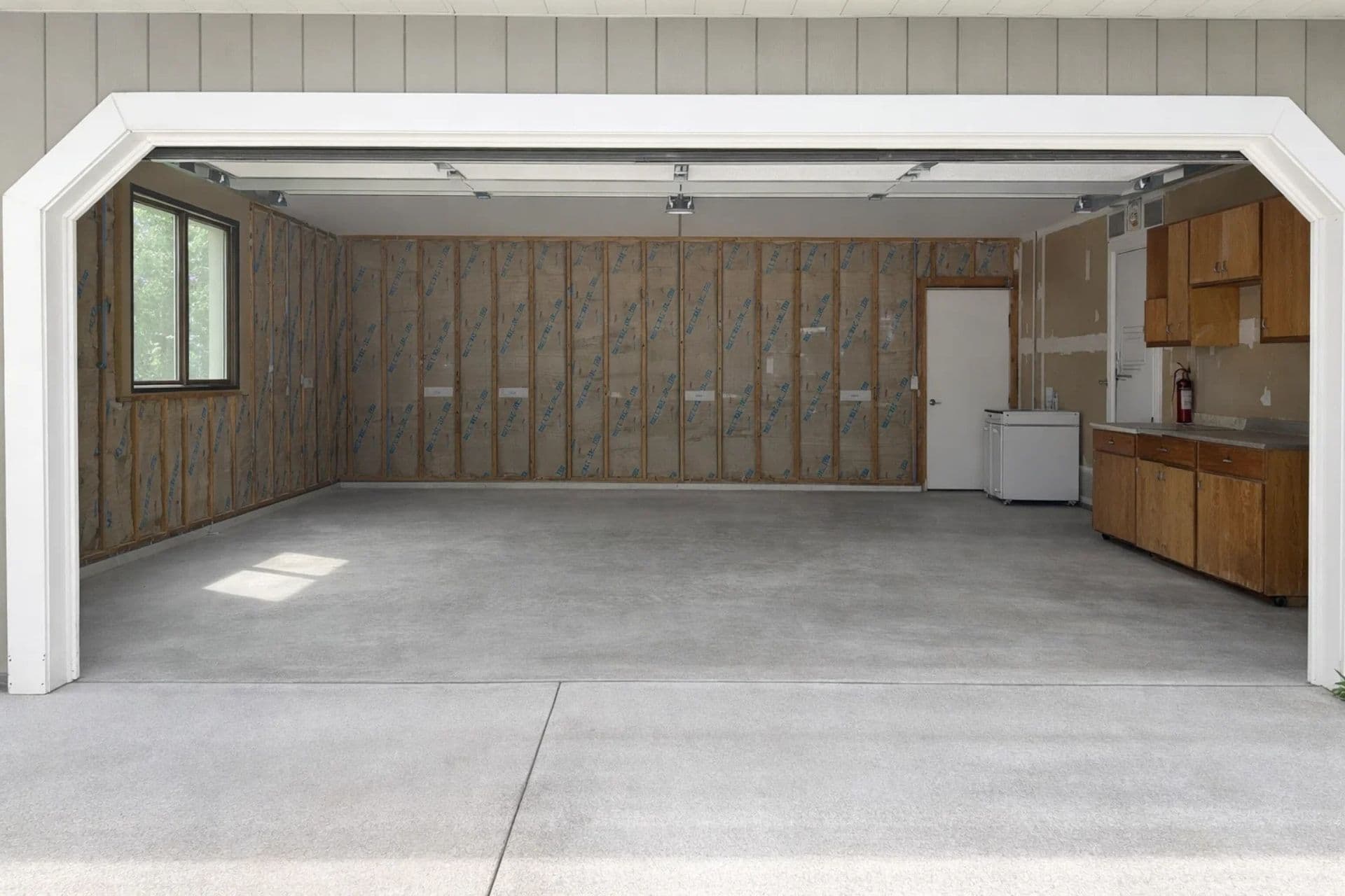2 Car garage -  Spacious garage with ample room for your vehicles and outdoor gear!