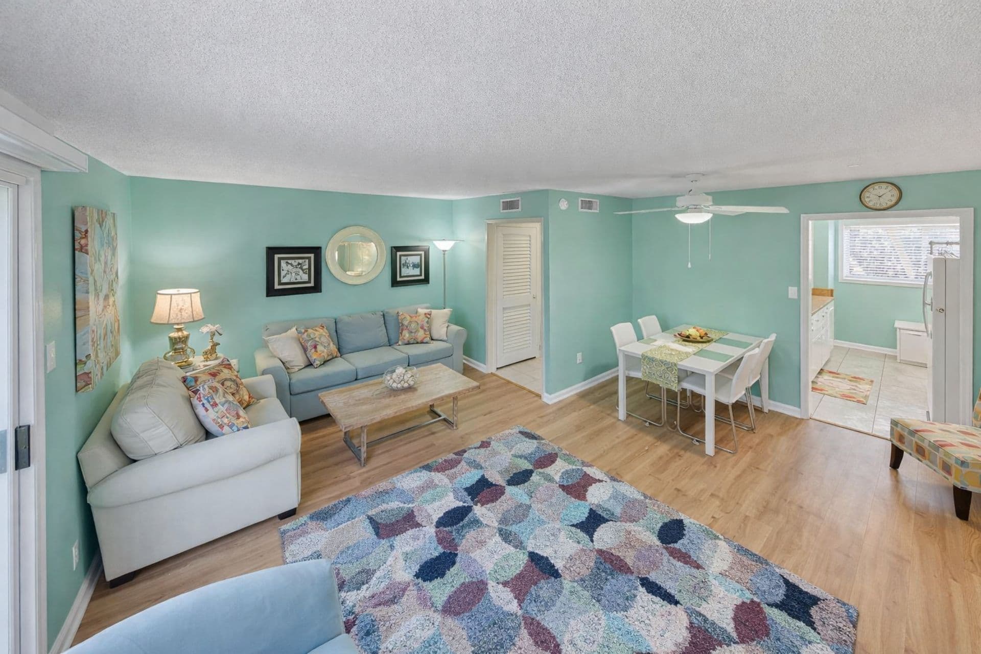 Living Room: Relax in vibrant hues with stylish decor and a perfect spot for fun gatherings!