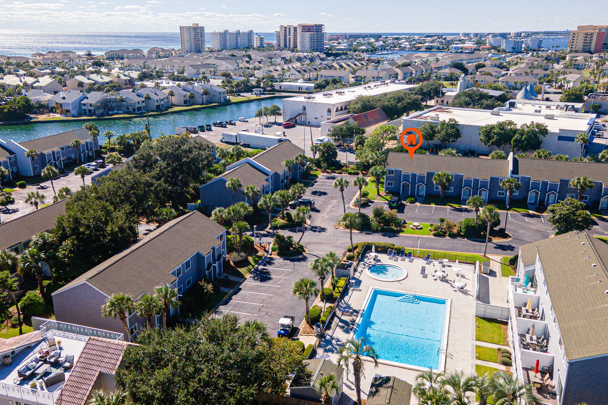 Exterior Views: Dive into vacation life with stunning poolside comforts and vibrant local charm!